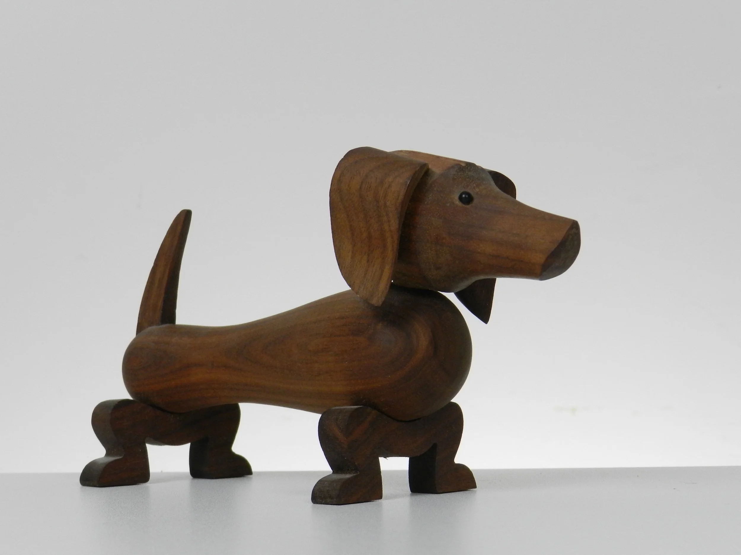 Teak dachshund figure designed by Kay Bojesen.  Denmark, recent production.