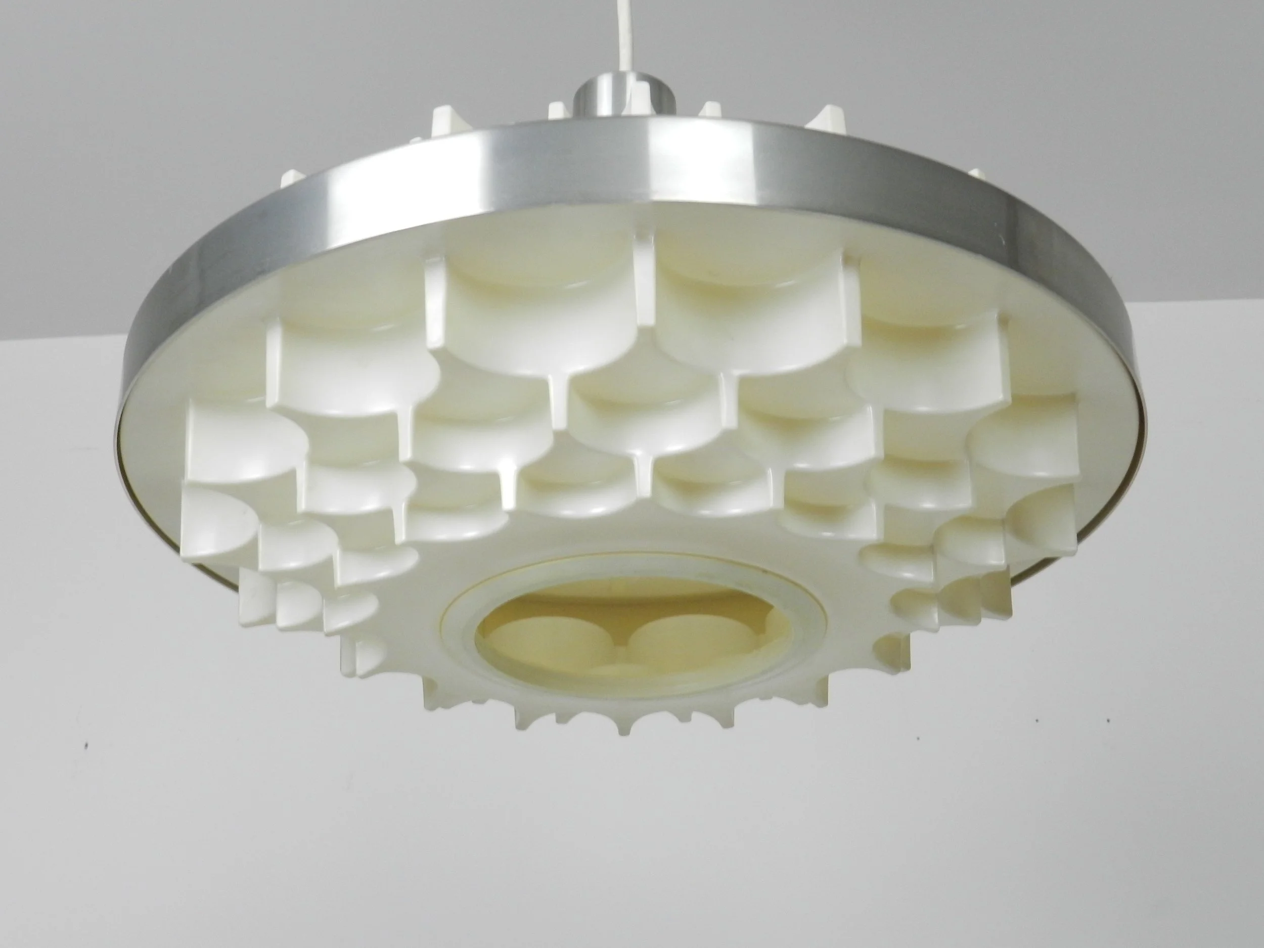 Mid century pendant lamp in plastic and aluminum. Attributed to Lars Schioler for Hoyrup.  Denmark, 1960s.