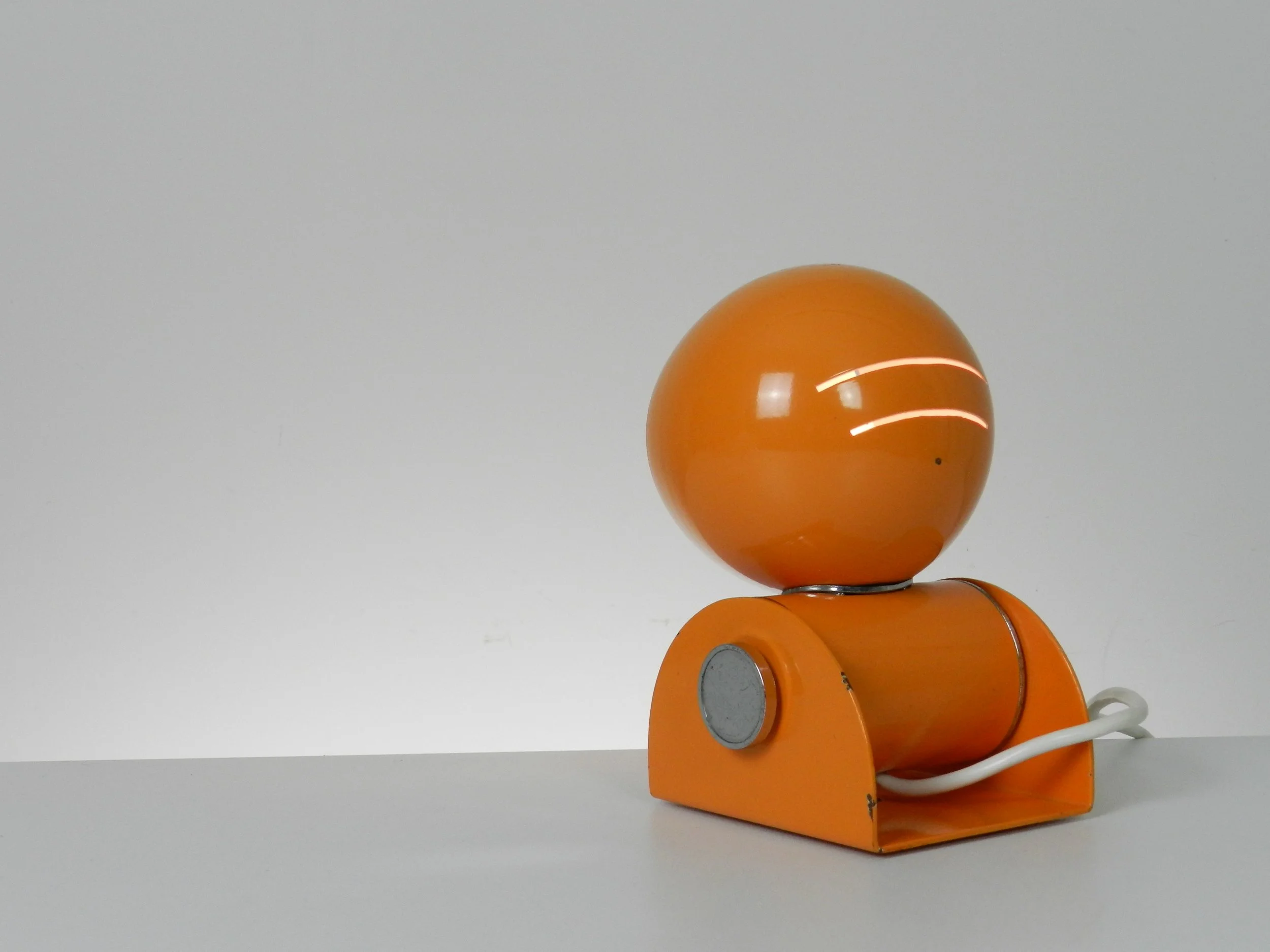 Eye ball table or wall lamp designed by Enrico Tronconi for Tronconi.  Italy, 1960s.