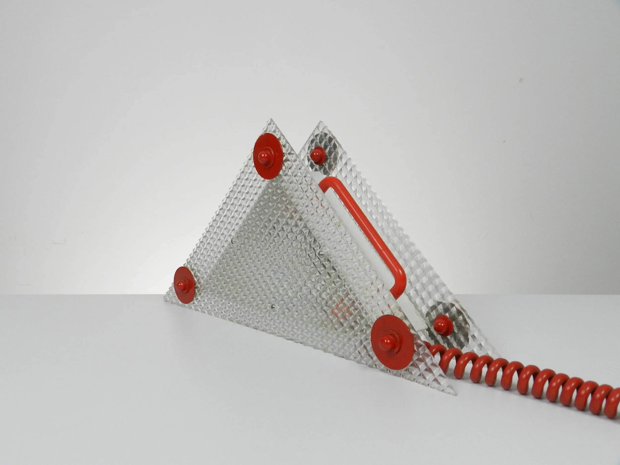 Memphis style post modern lamp in plastic with metal frame.  Designer unknown, 1980s.