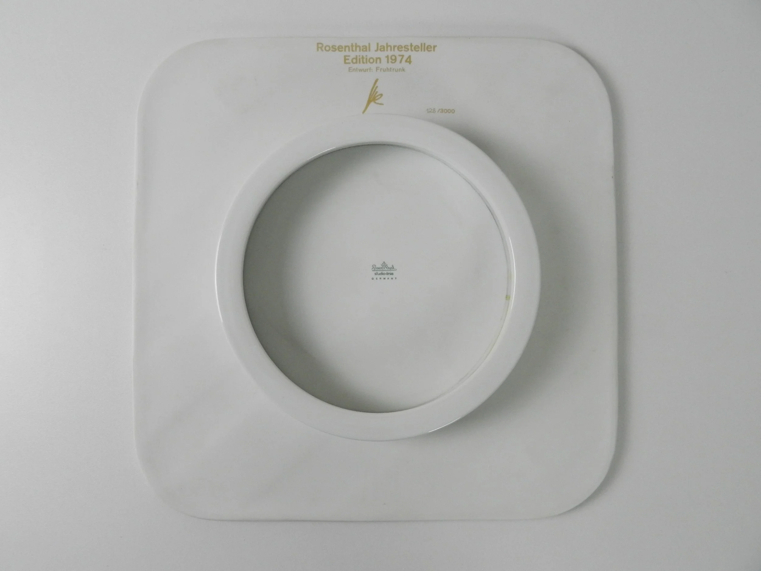 Porcelain wall plaque / plate designed by Gunter Fruhtrunk for Rosenthal. Limited edition 128/3000.  Germany, 1974.