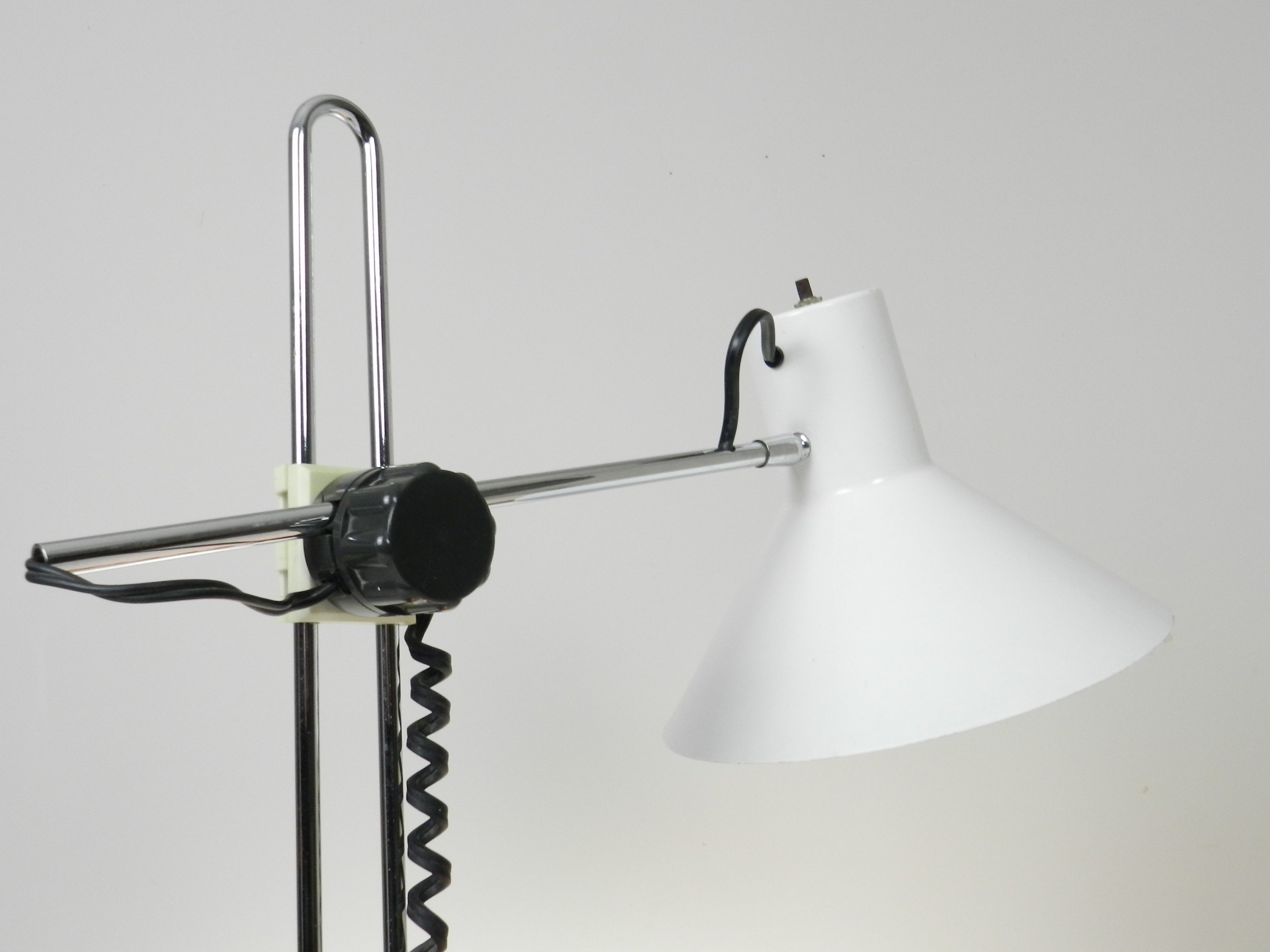 Modernist desk lamp in chrome, plastic and enameled metal by Nanbu.  Japan, 1970s.