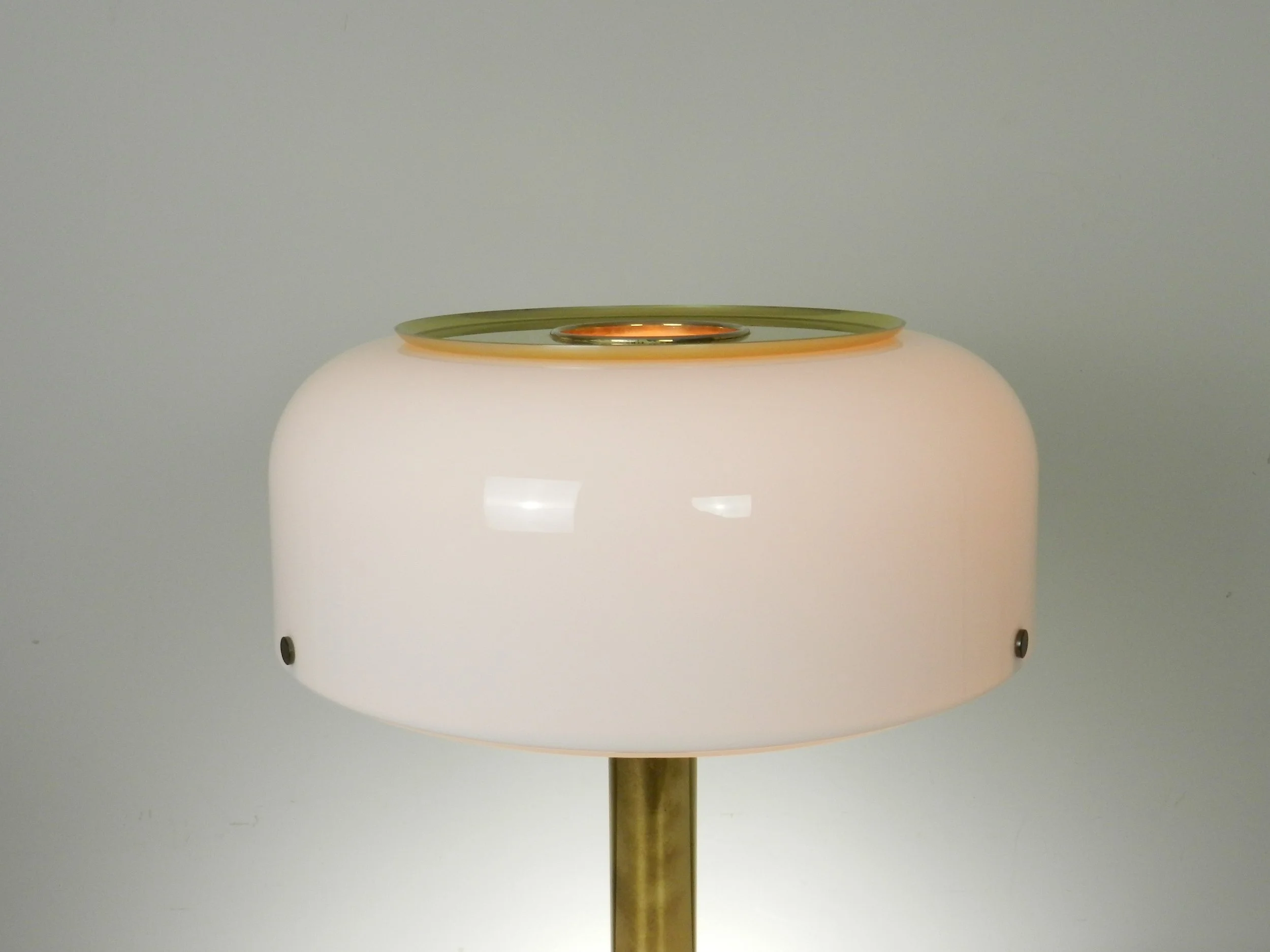 Modernist Knubbling table lamp in brass with plastic shade. Designed by Anders Pehrson for Atelje Lyktan.  Sweden, 1970s.