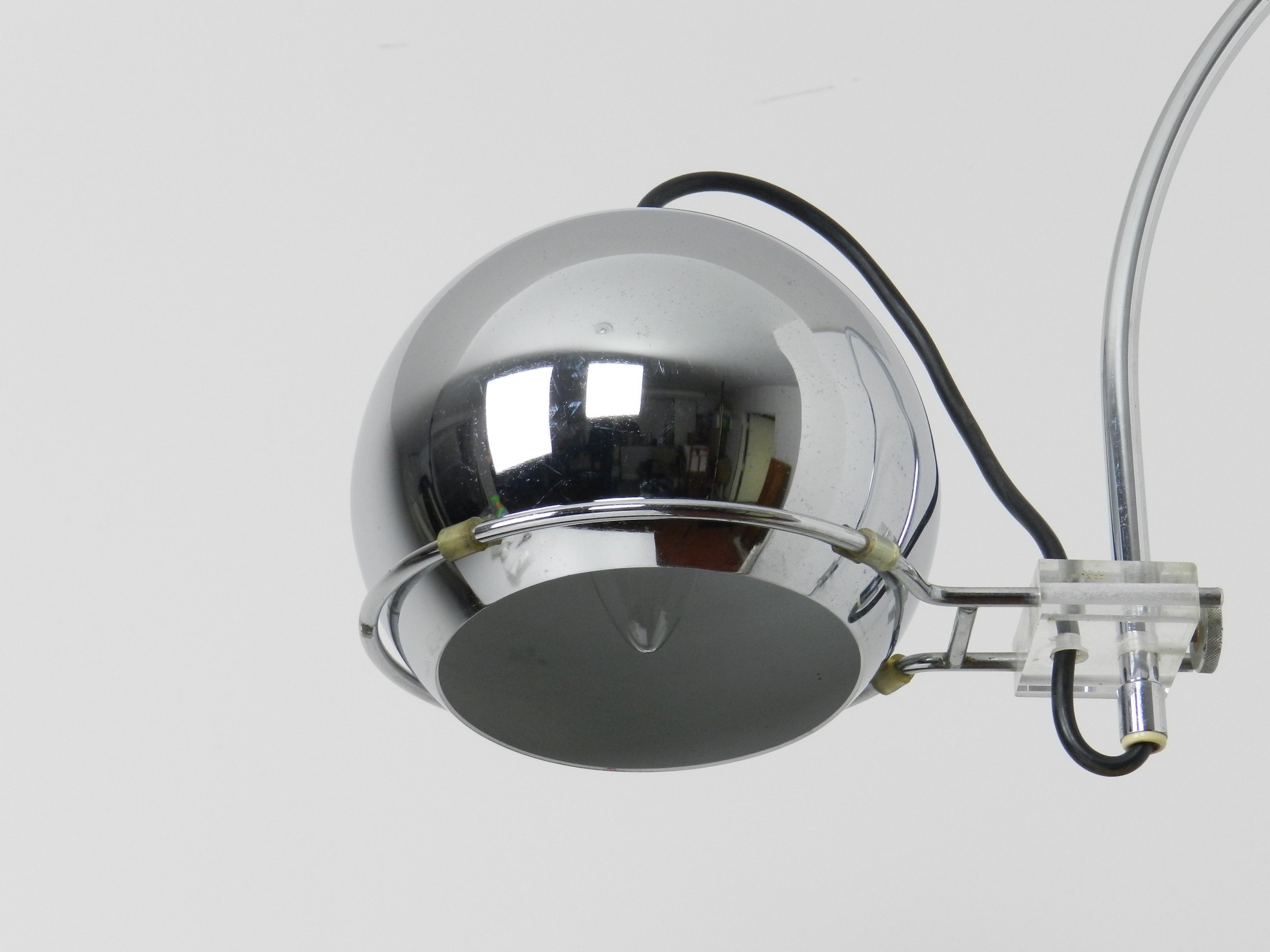 Chrome space age arc wall lamp by Gepo.  Netherlands, 1970s.