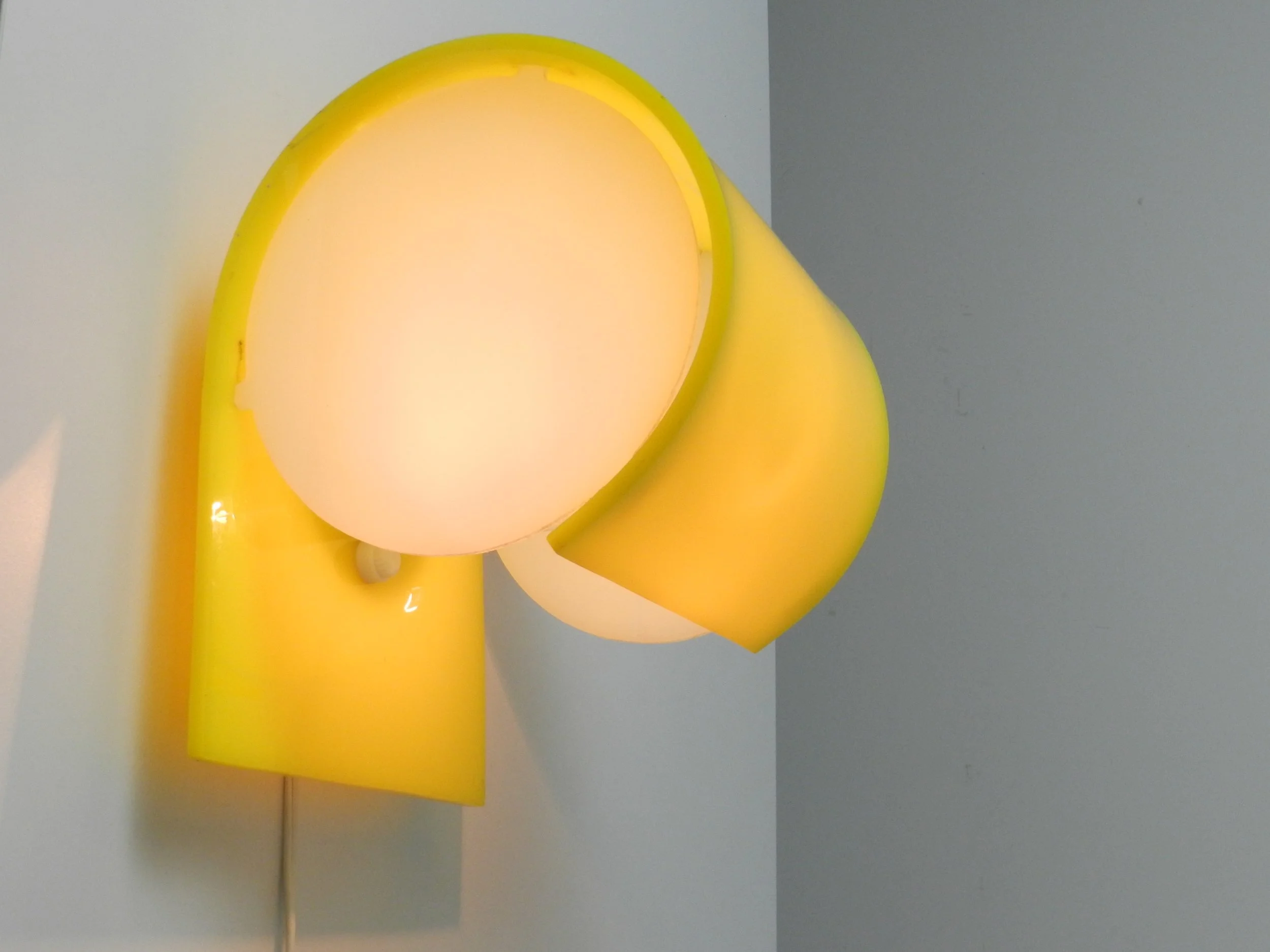 Space age Glo-Up acrylic wall sconce designed by Douglas Ball and John Berezowsky for Danesco.  Canada, 1970s.