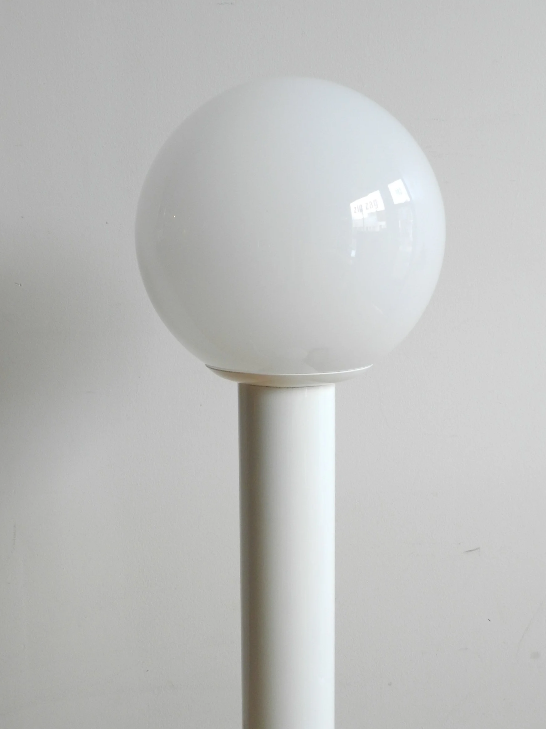 Space age floor lamp in enameled metal with glass shade.  circa 1970s.
