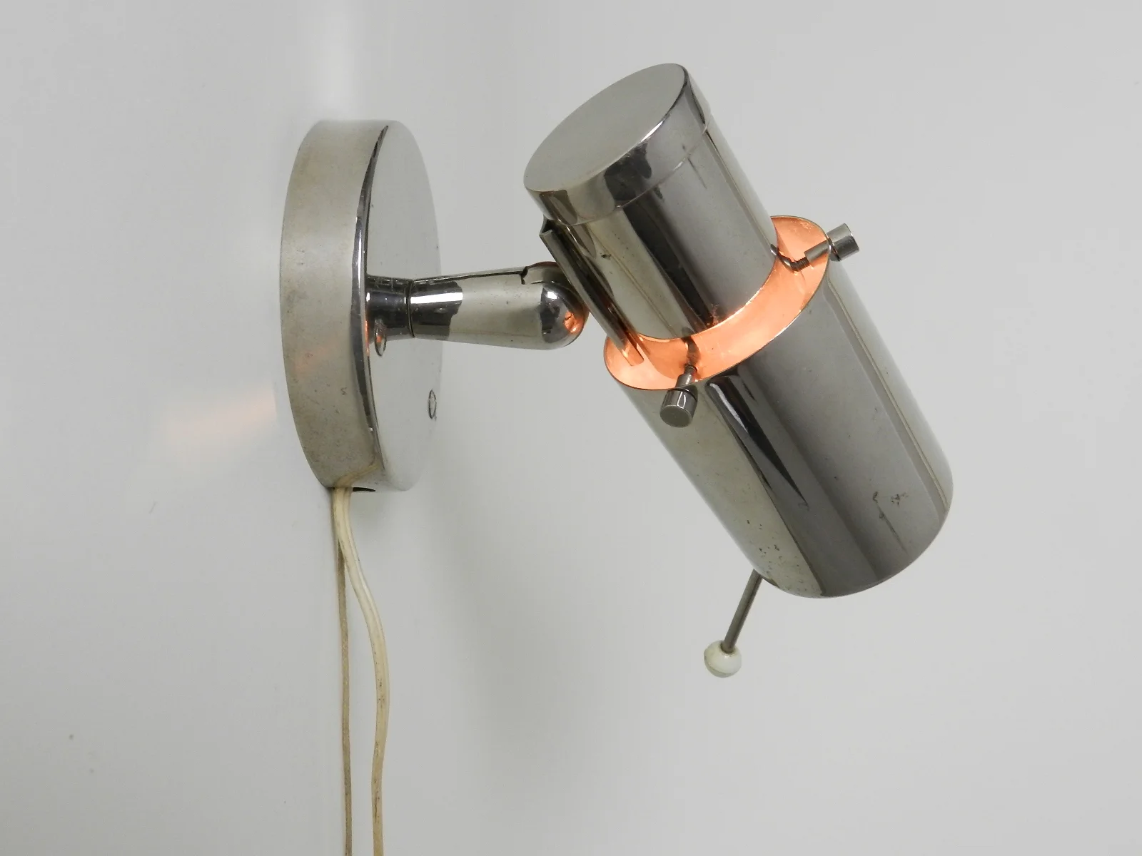 "Zodiaque" spot lamp in chrome metal with glass lens.  Designed by Jacques Biny for Lita.  France, 1950s