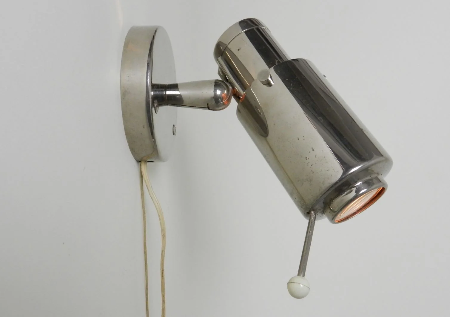 "Zodiaque" spot lamp in chrome metal with glass lens.  Designed by Jacques Biny for Lita.  France, 1950s