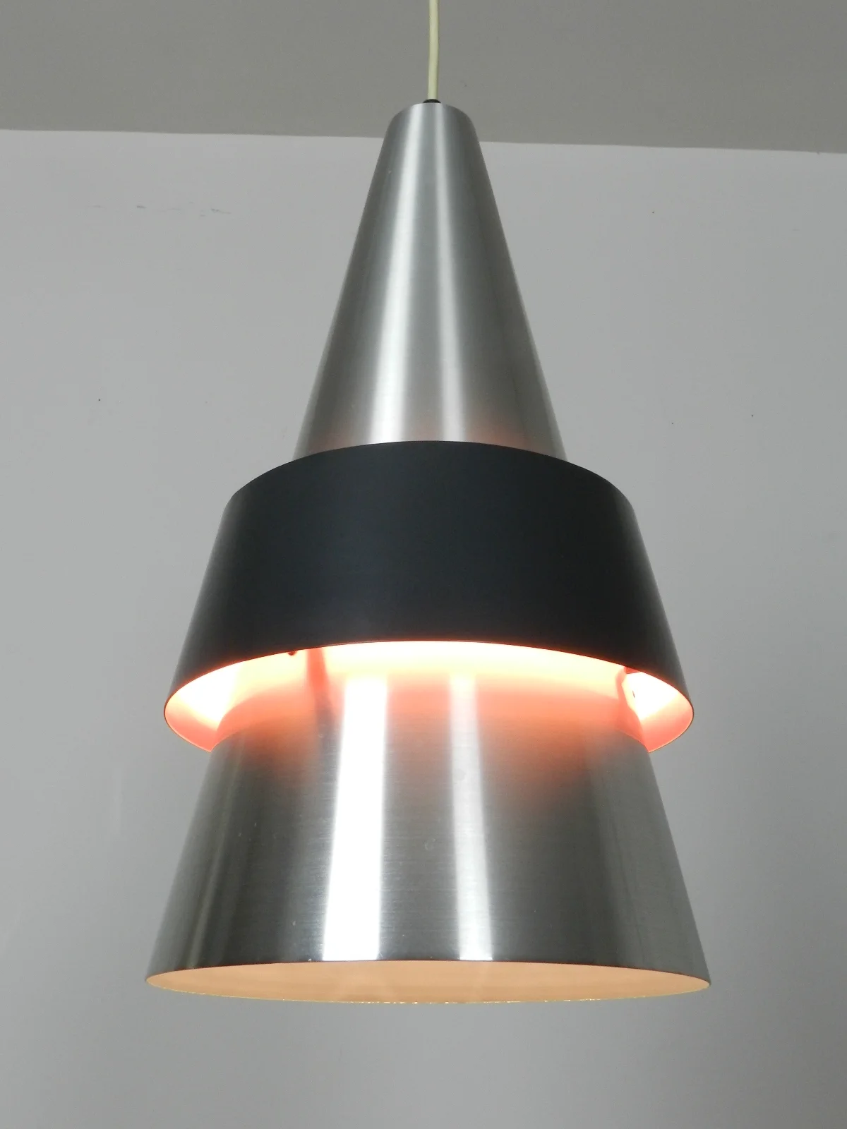 “Corona” pendant lamp in aluminum.  Designed by Jo Hammerborg for Fog & Morup.  Denmark, 1960s.