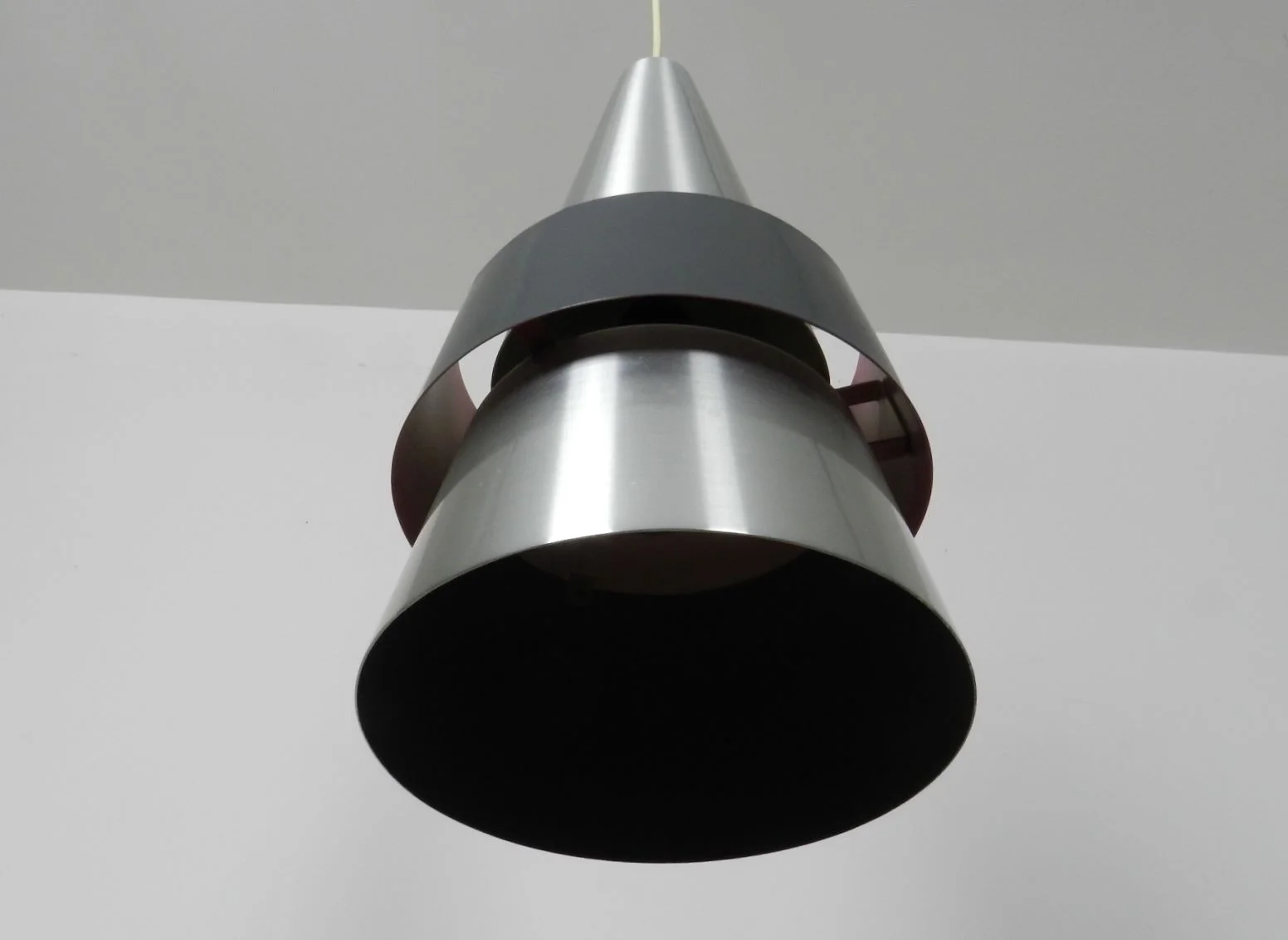 “Corona” pendant lamp in aluminum.  Designed by Jo Hammerborg for Fog & Morup.  Denmark, 1960s.