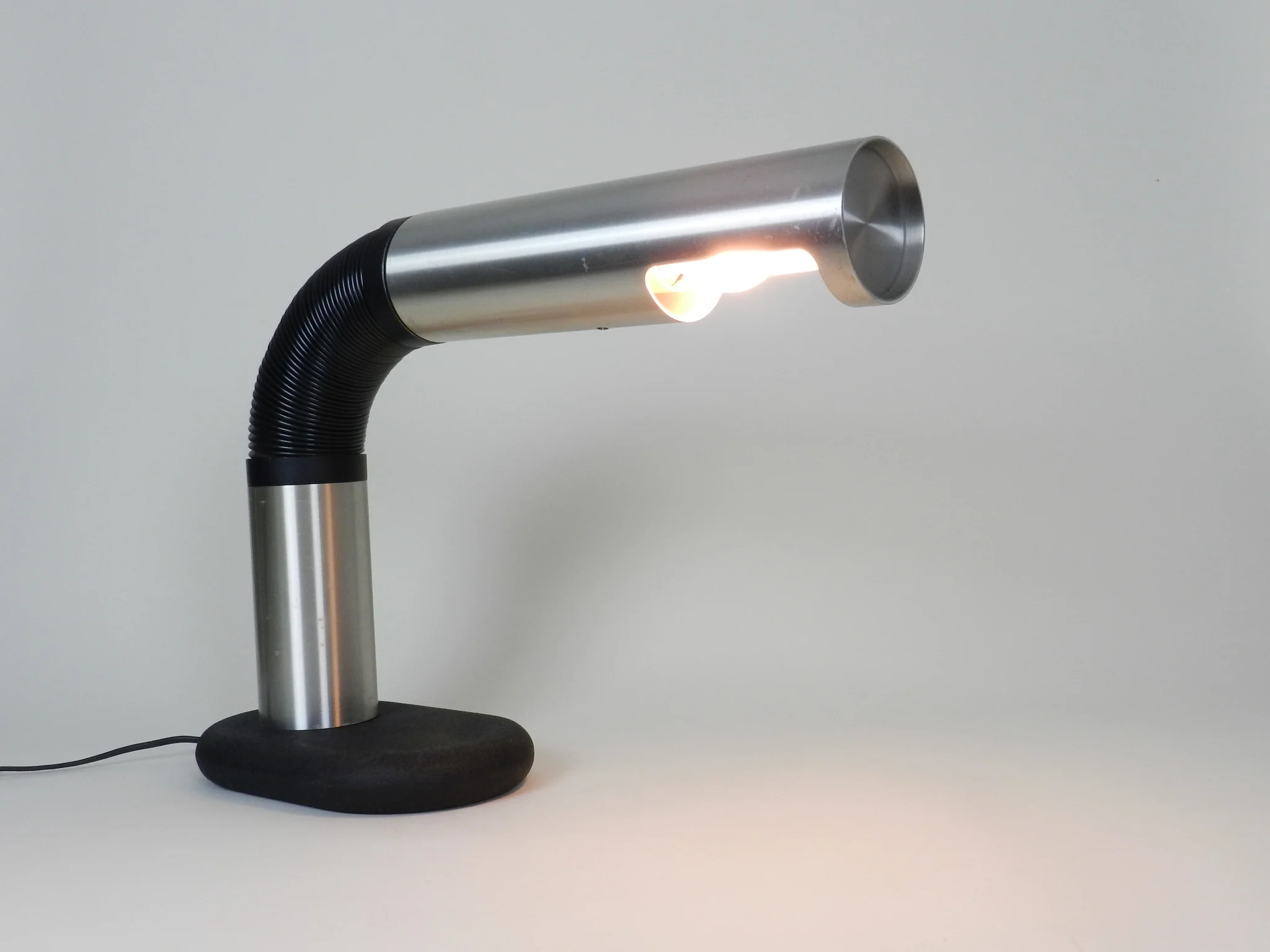 Large desk lamp in aluminum and plastic with cast iron base.  By Raak, Netherlands, 1970s.
