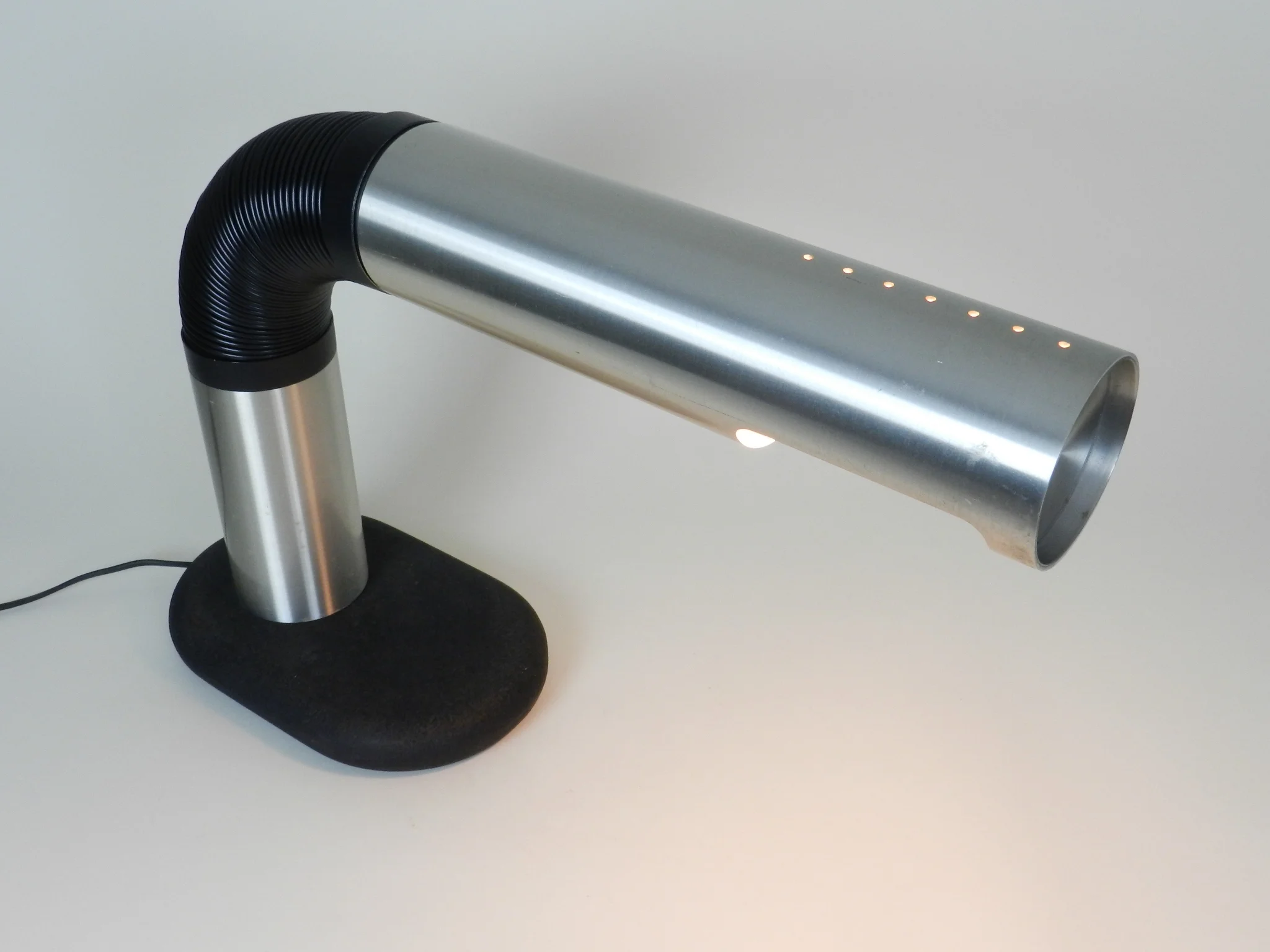 Large desk lamp in aluminum and plastic with cast iron base.  By Raak, Netherlands, 1970s.