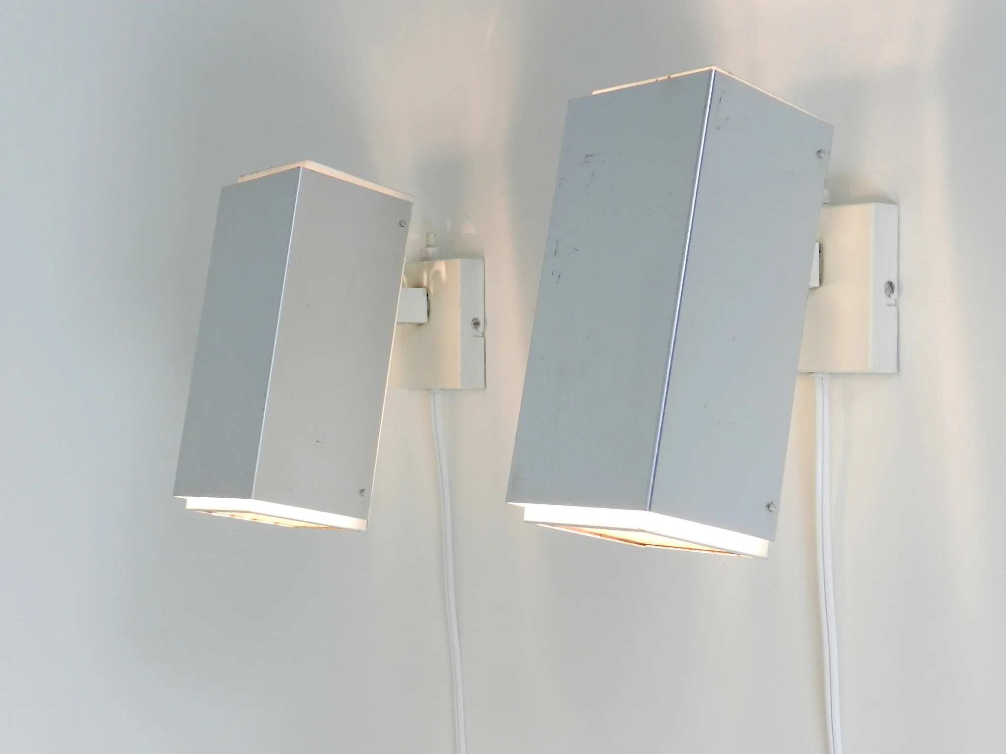 Pair of wall lamp in aluminum and painted metal with plastic waffle diffussers.  Designed by Preben Dal  Denmark, 1960s.