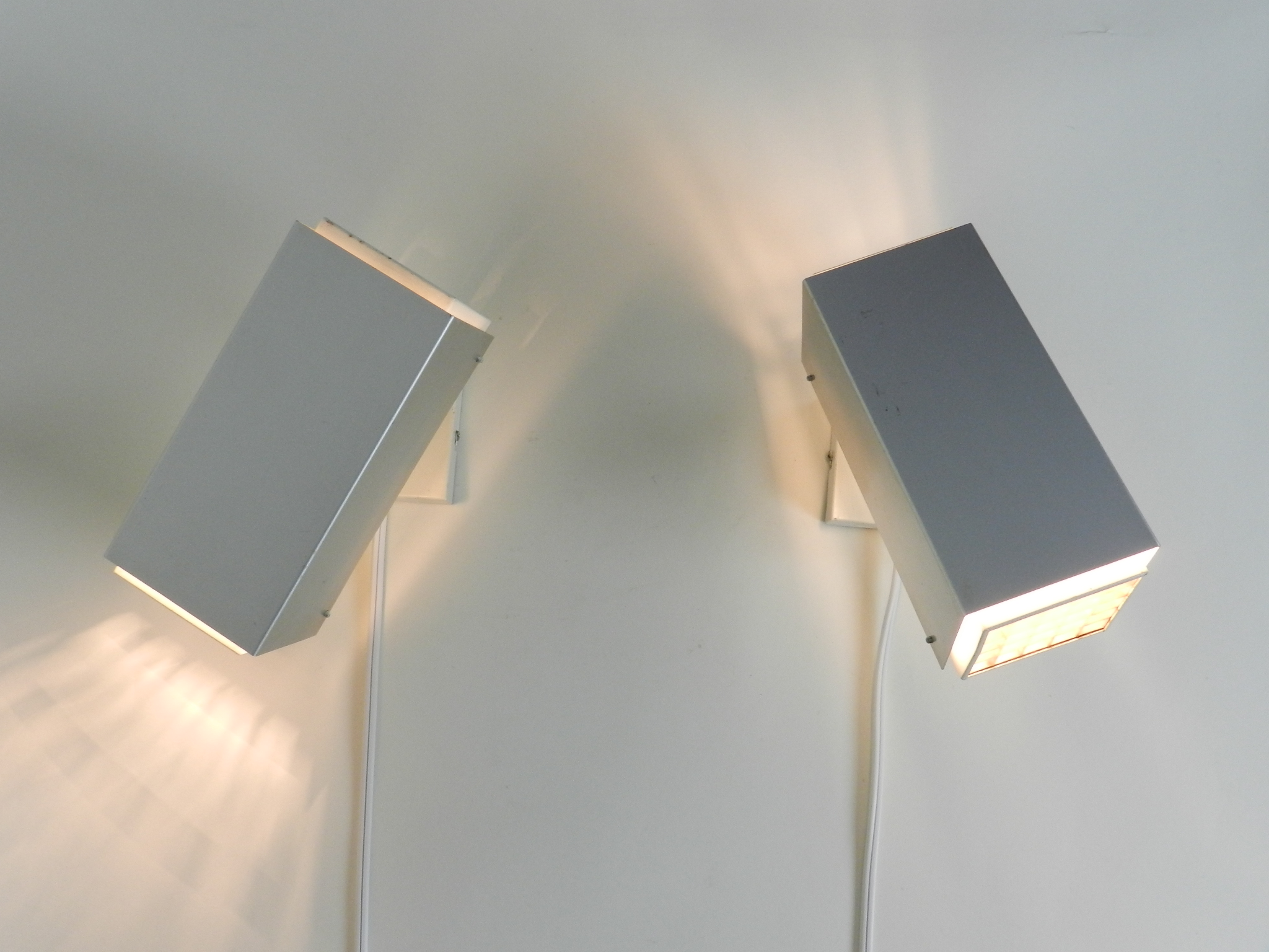 Pair of wall lamp in aluminum and painted metal with plastic waffle diffussers.  Designed by Preben Dal  Denmark, 1960s.