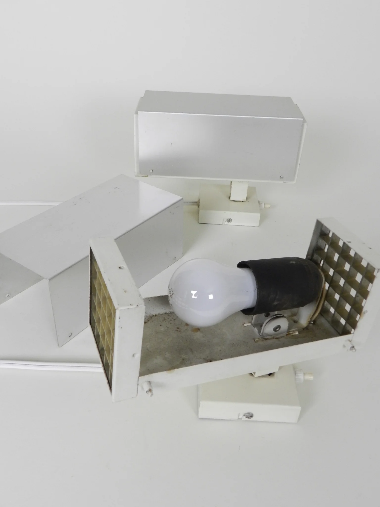 Pair of wall lamp in aluminum and painted metal with plastic waffle diffussers.  Designed by Preben Dal  Denmark, 1960s.