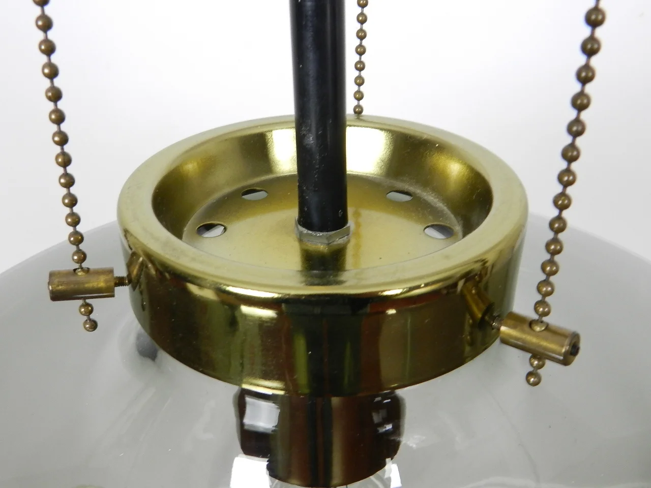 Pendant lamp by Raak. Smoked glass shade with bronze colored hardware.  Netherlands, 1960s.