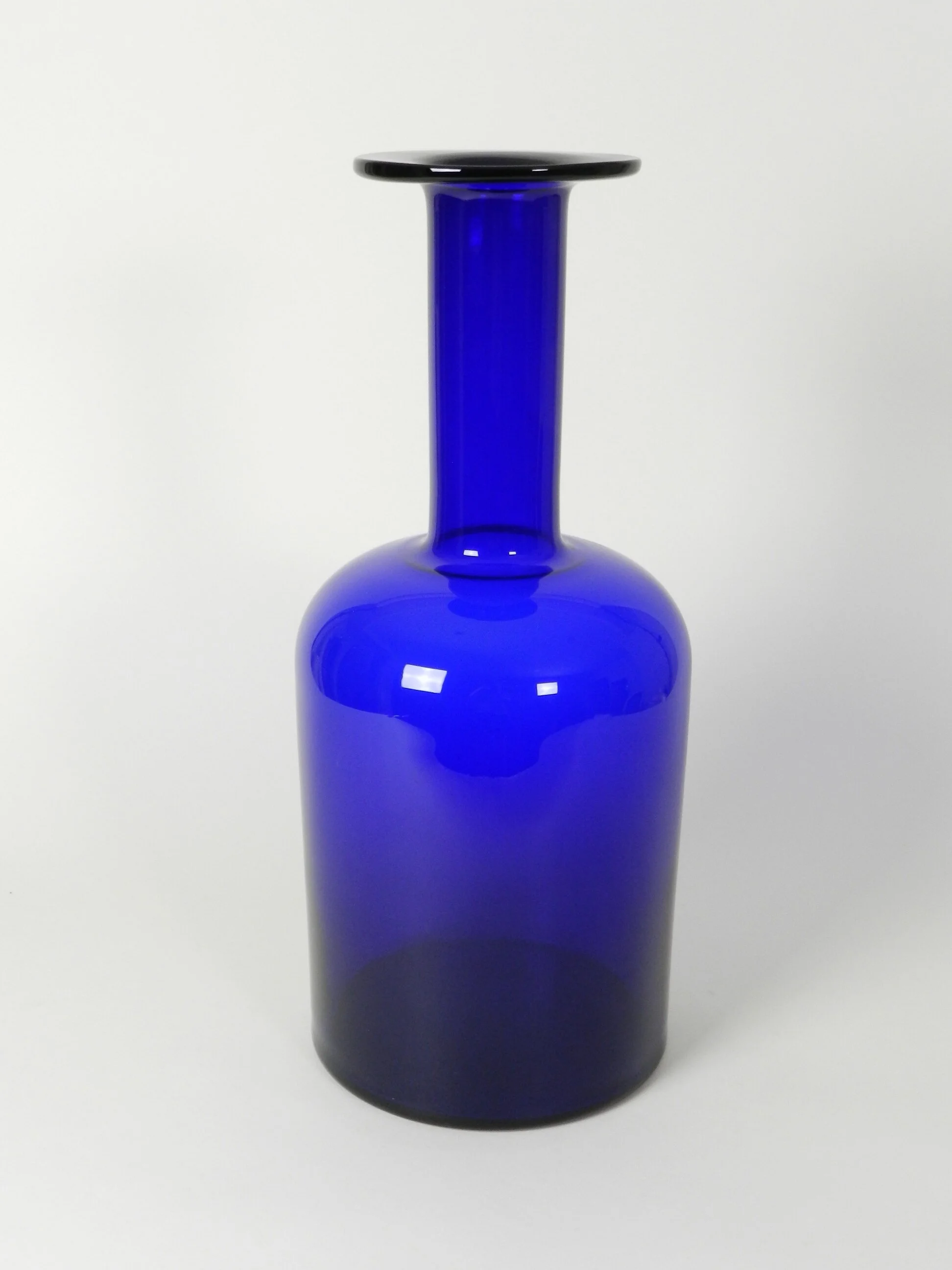 Cobalt blue glass Gulvases designed by Otto Brauer for Holmegaard.  Denmark, 1960s.  19.25” high.