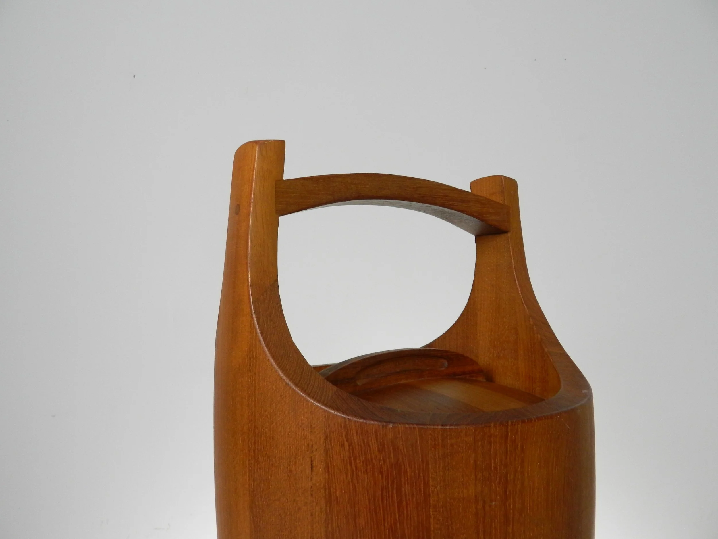 Congo ice buckets in staved teak designed by Jens Quistgaard for Dansk.  Denmark, 1960s.