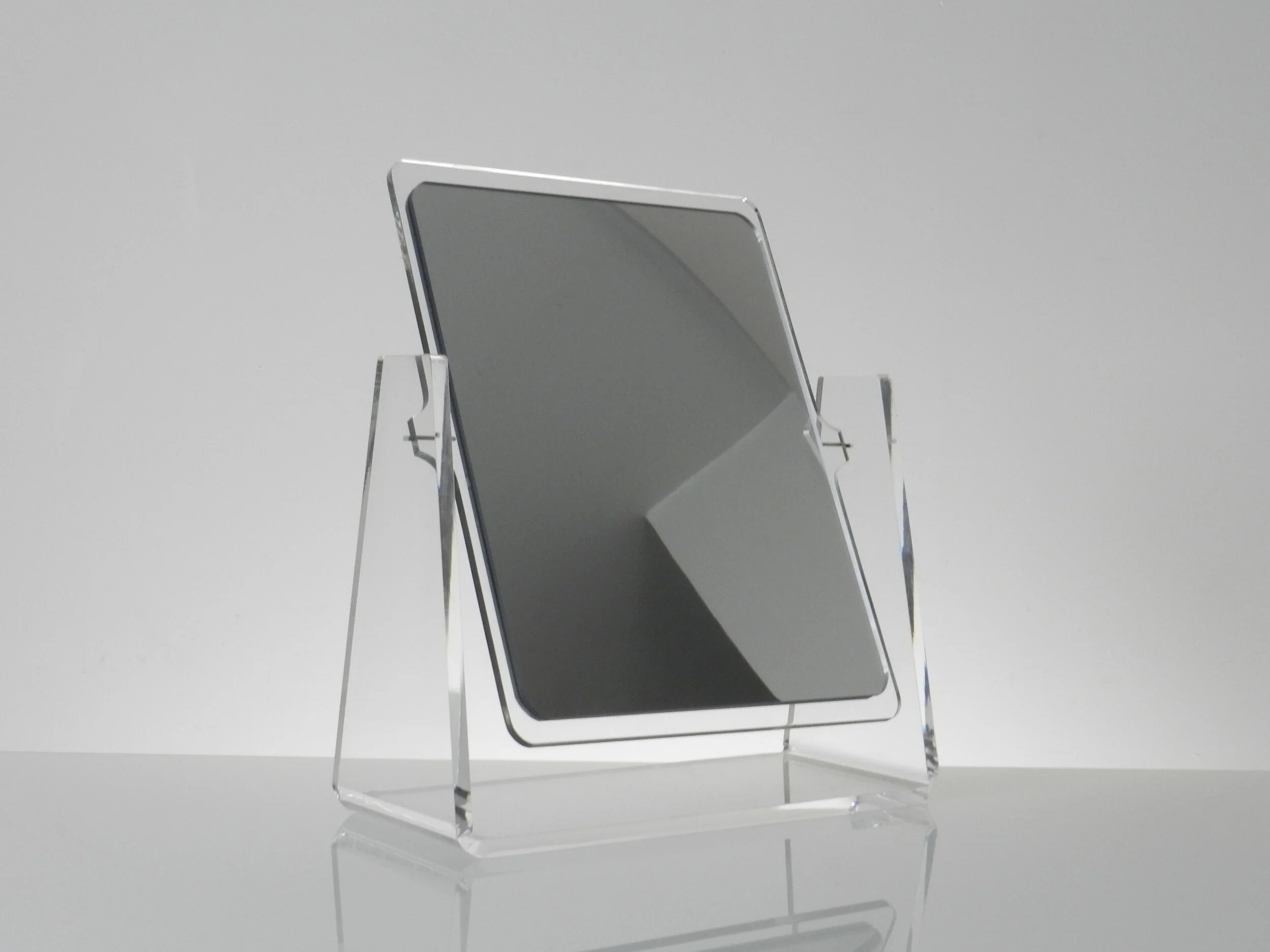 Table top double side vanity mirror in lucite.  circa 1980s.