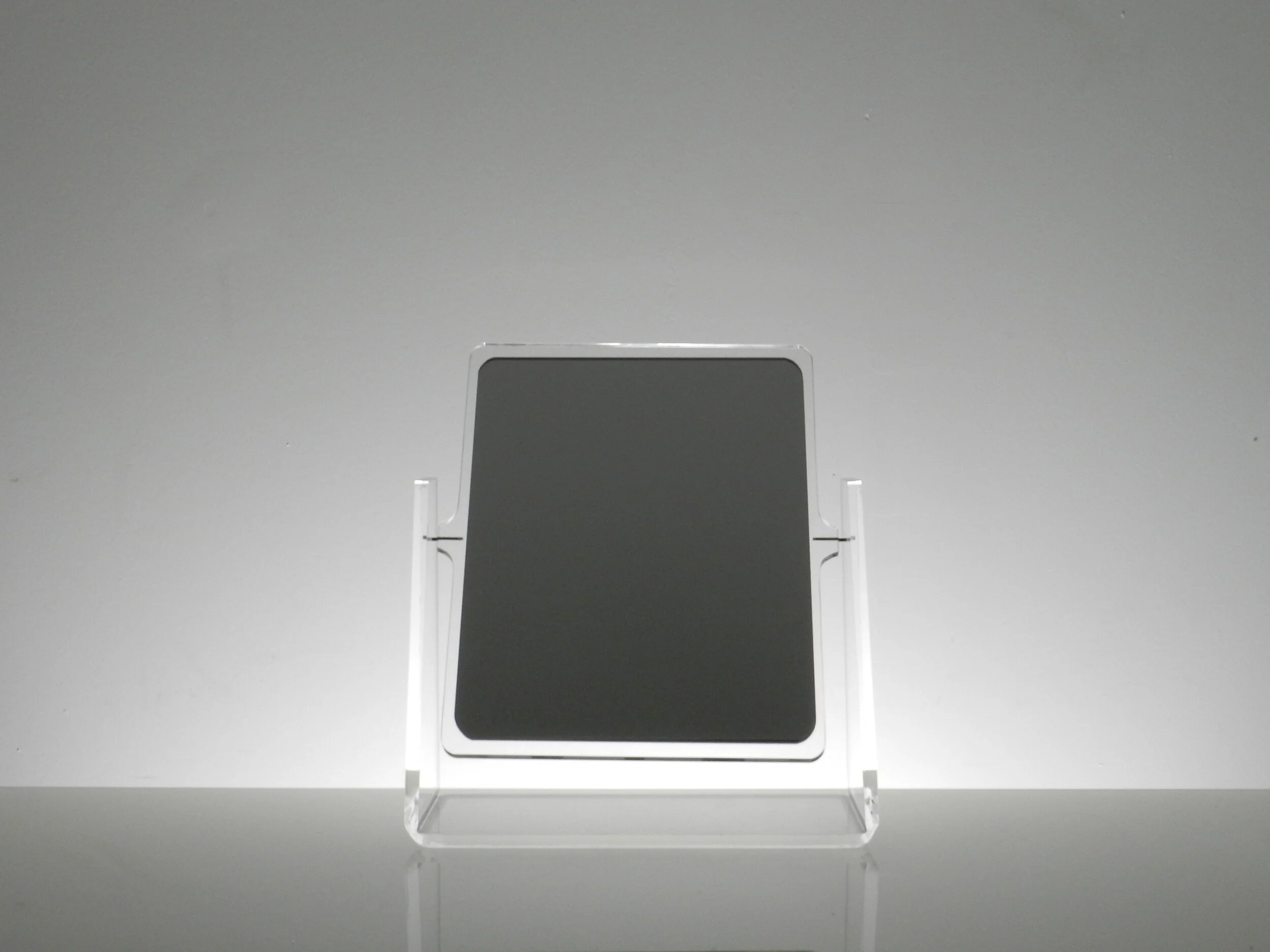 Table top double side vanity mirror in lucite.  circa 1980s.
