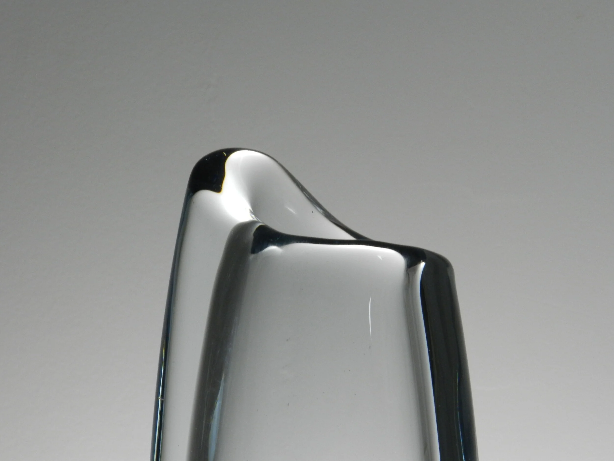 Clear glass vases atrributed to Gunnar Nylund for Strombergshyttan, unsigned.  Sweden, 1960s.