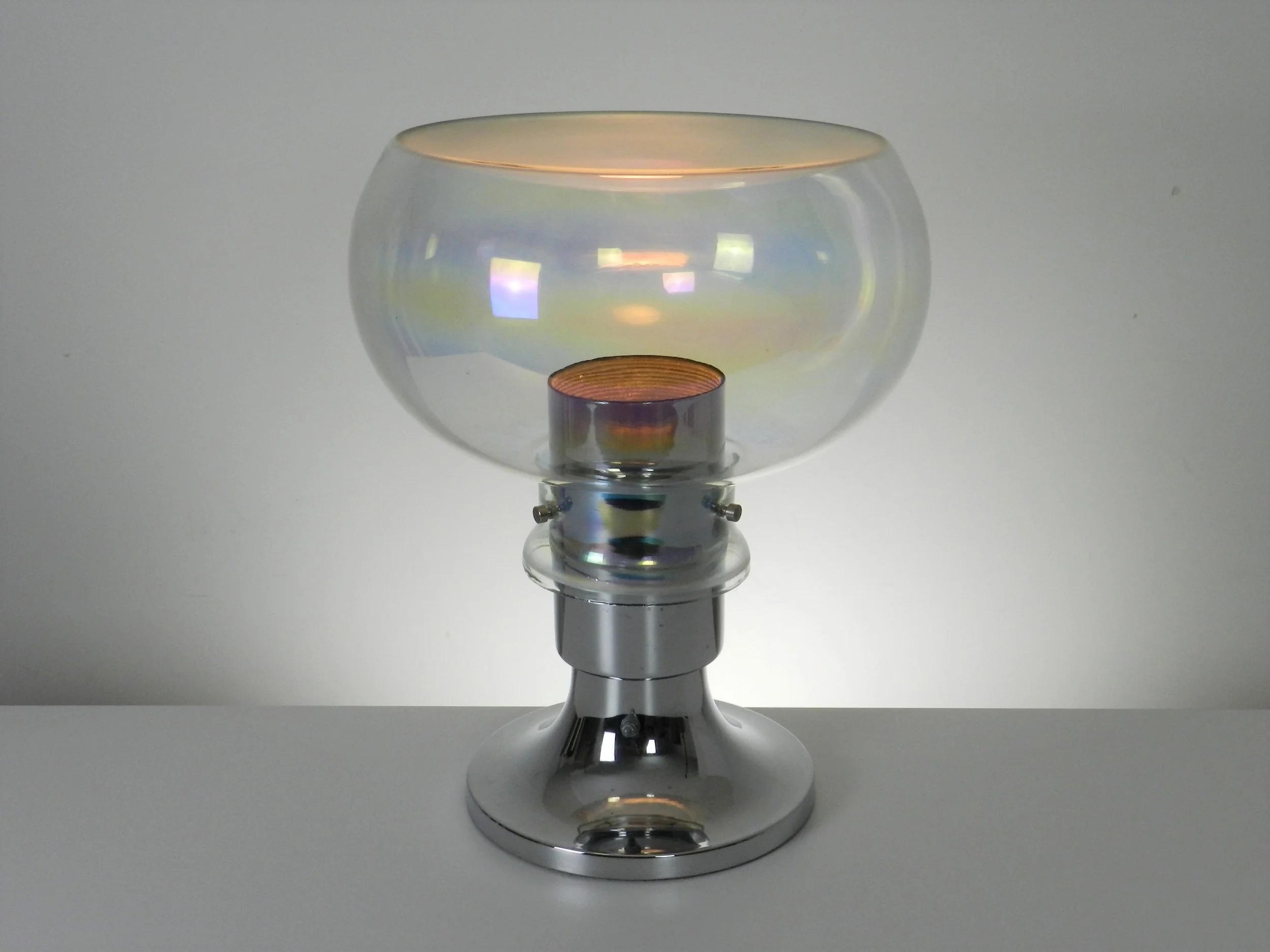 Space age lamp in chrome and iridescent glass with frosted top. Created by Thomas Industries.  USA, 1970s.