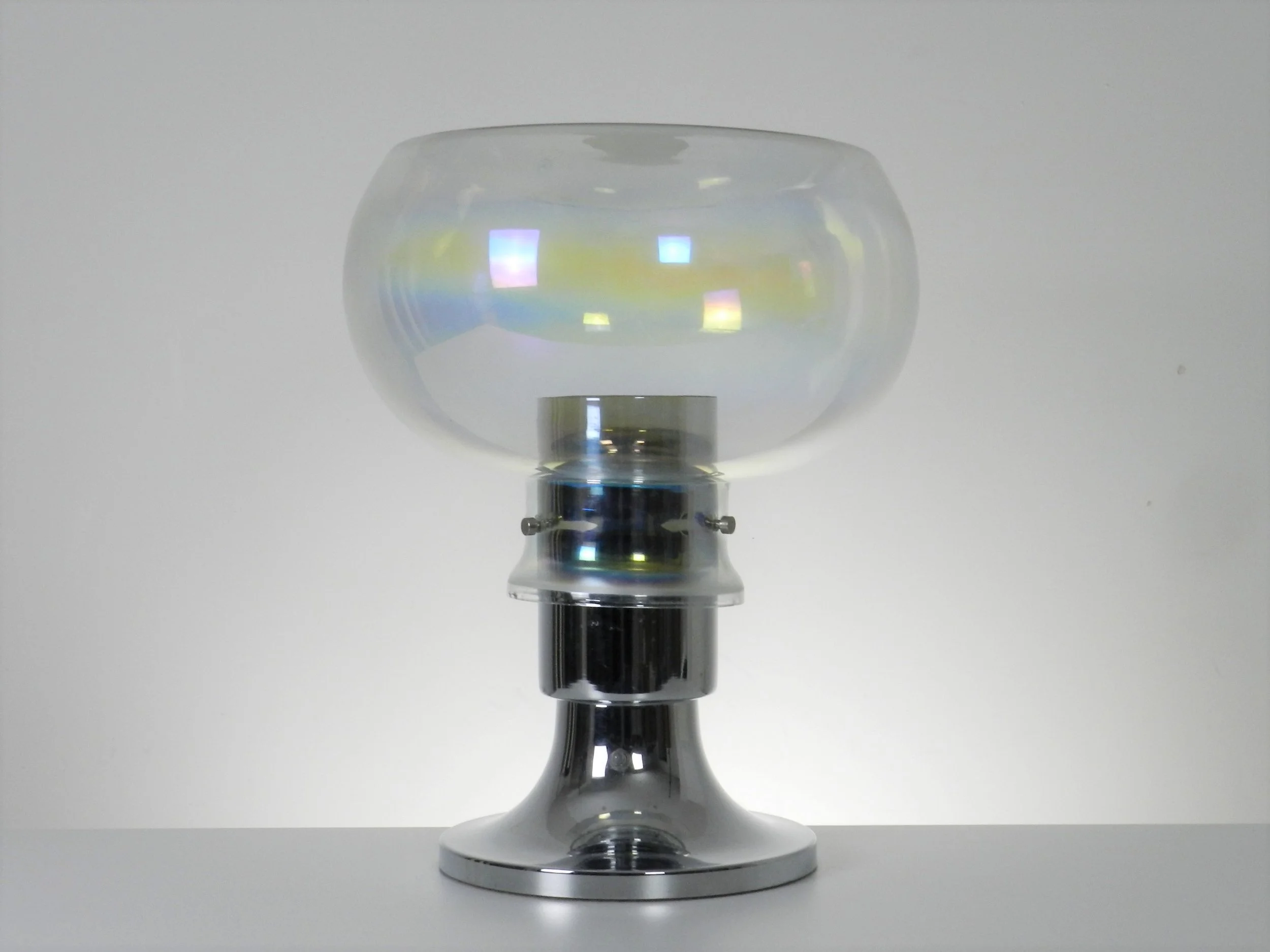 Space age lamp in chrome and iridescent glass with frosted top. Created by Thomas Industries.  USA, 1970s.