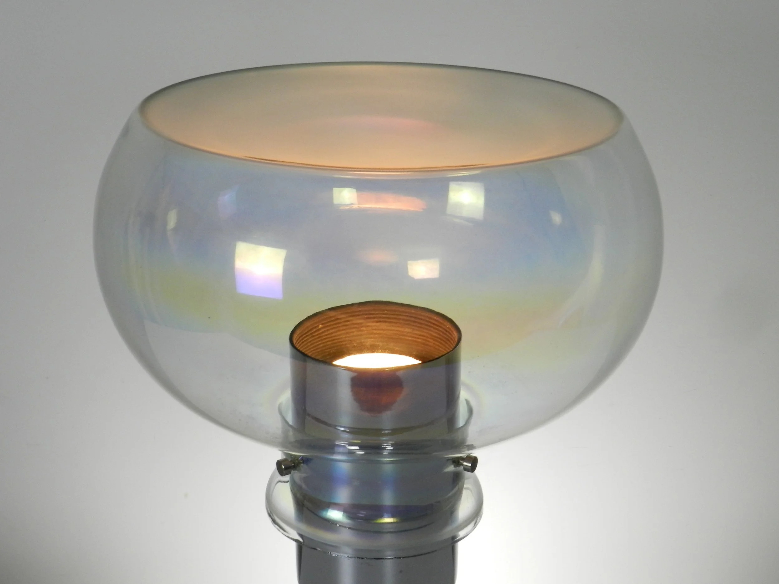 Space age lamp in chrome and iridescent glass with frosted top. Created by Thomas Industries.  USA, 1970s.
