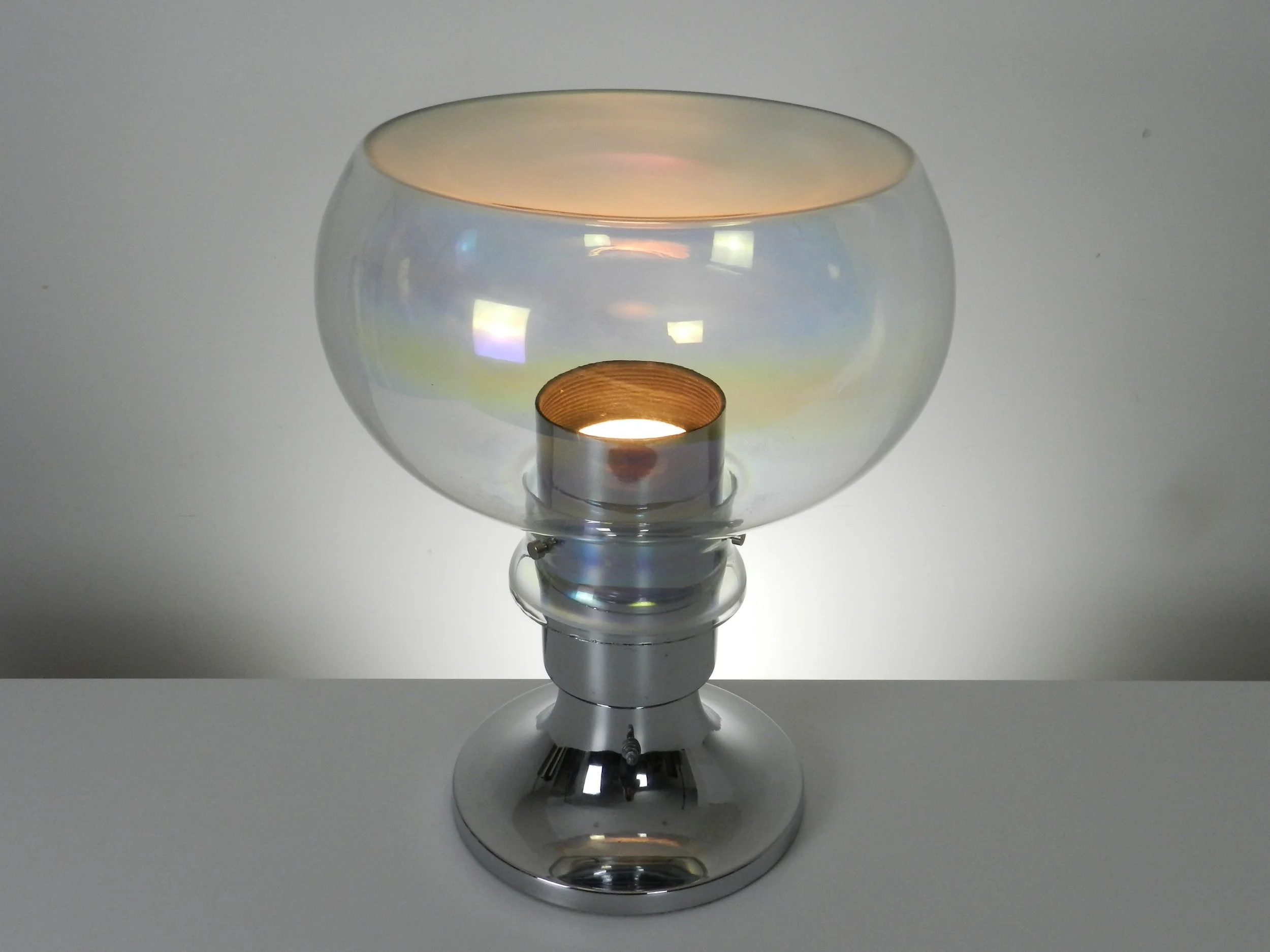 Space age lamp in chrome and iridescent glass with frosted top. Created by Thomas Industries.  USA, 1970s.