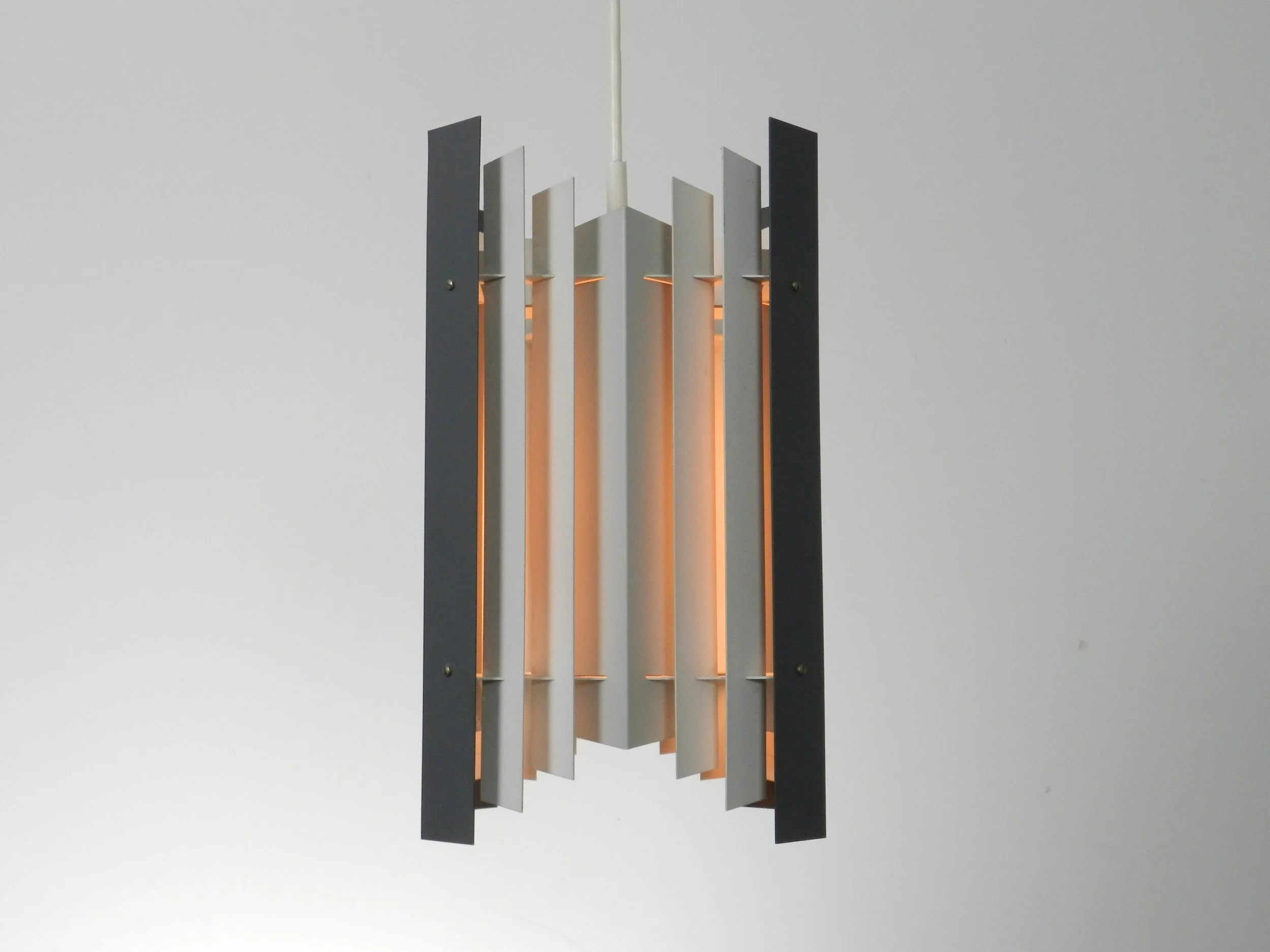 Pendant lamp in enameled metal designed by Preben Dahl for Hans Folsgaard.  Denmark, 1960s.
