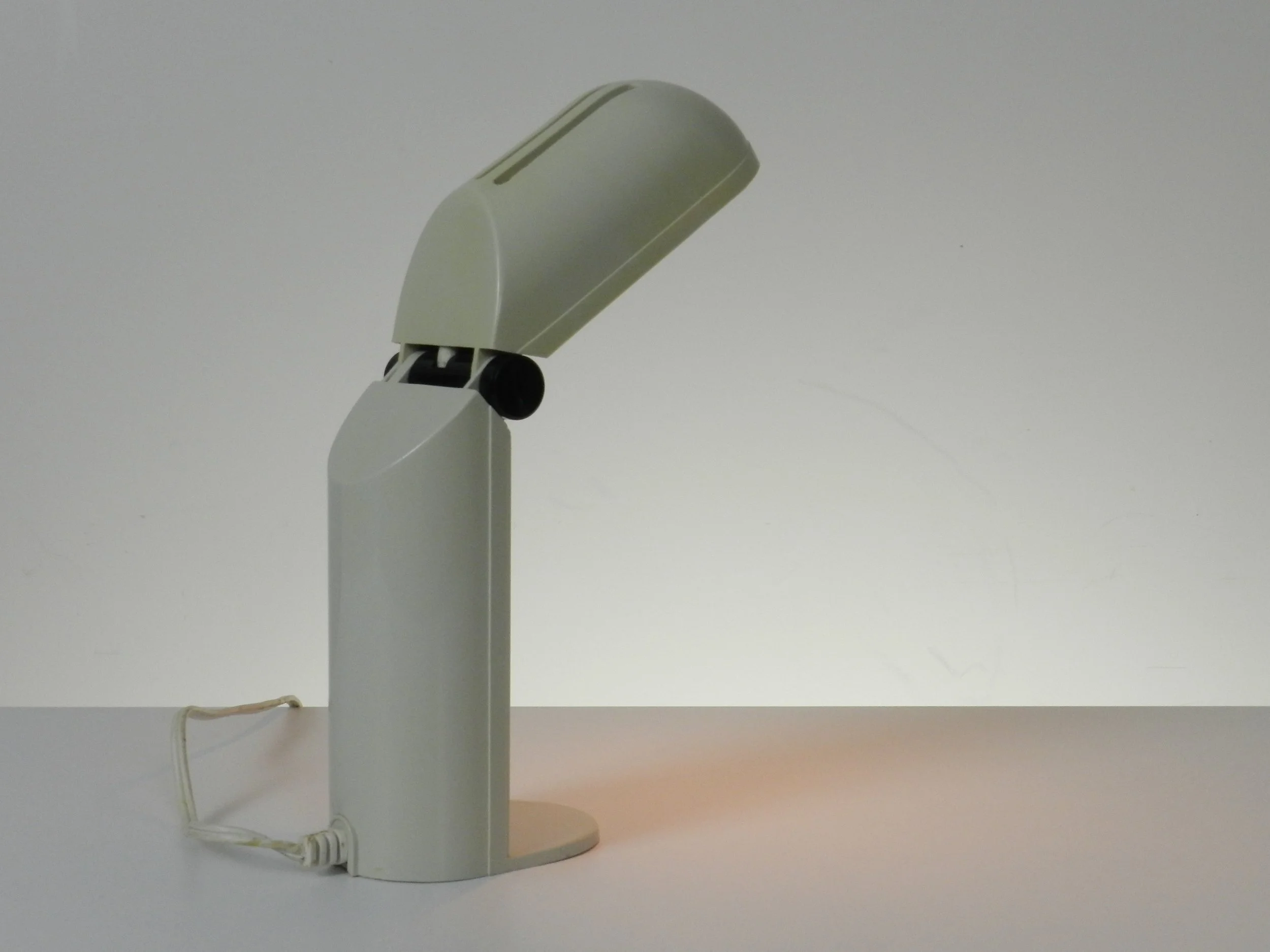 Folding “Manon” space age lamp by Yamada Shomei.  Turns on automatically when head is unfolded.  circa 1970s.