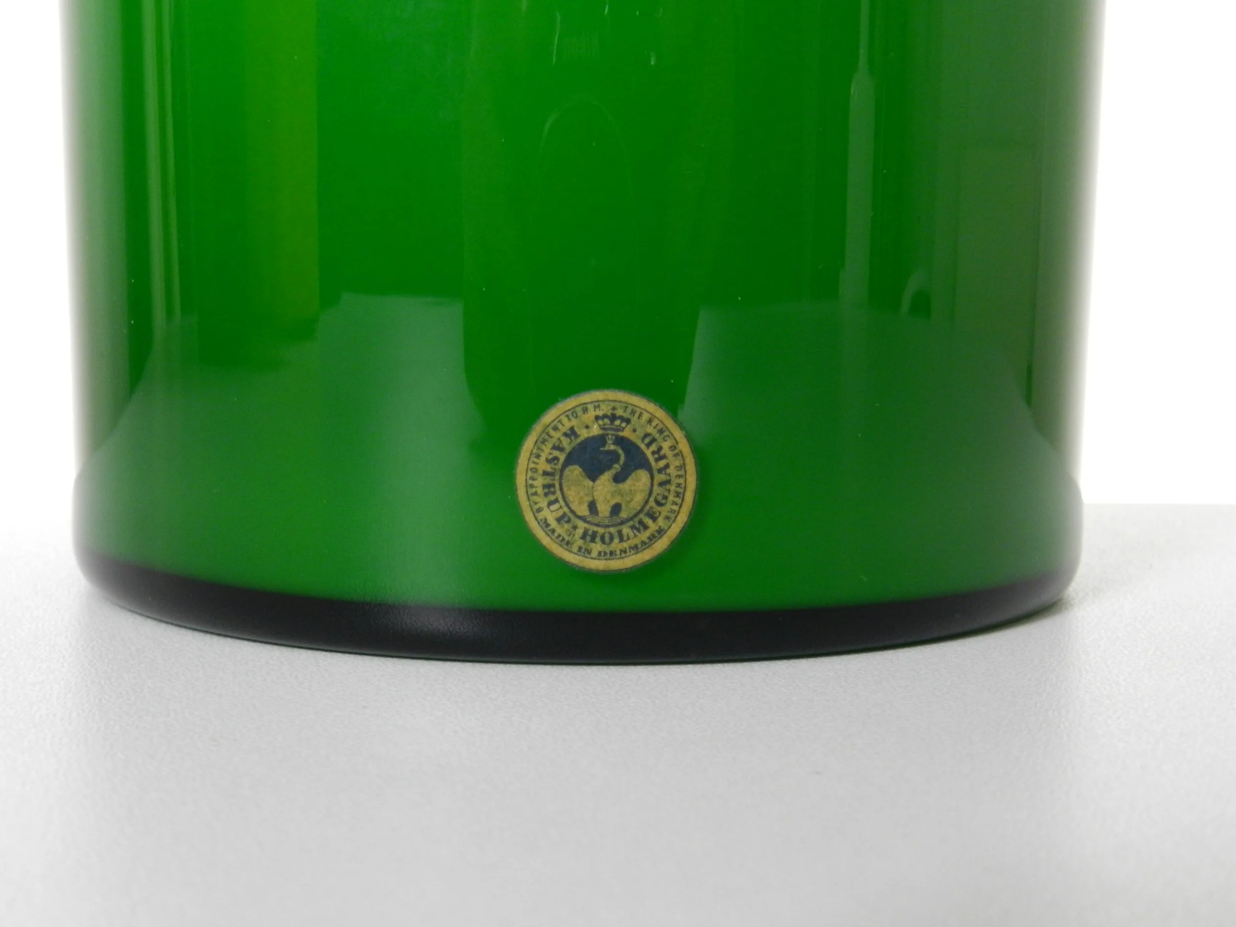 Green cased glass Gulvase designed by Otto Brauer for Holmegaard.  Denmark, 1960s.  11.75” high x 4.5” diameter.