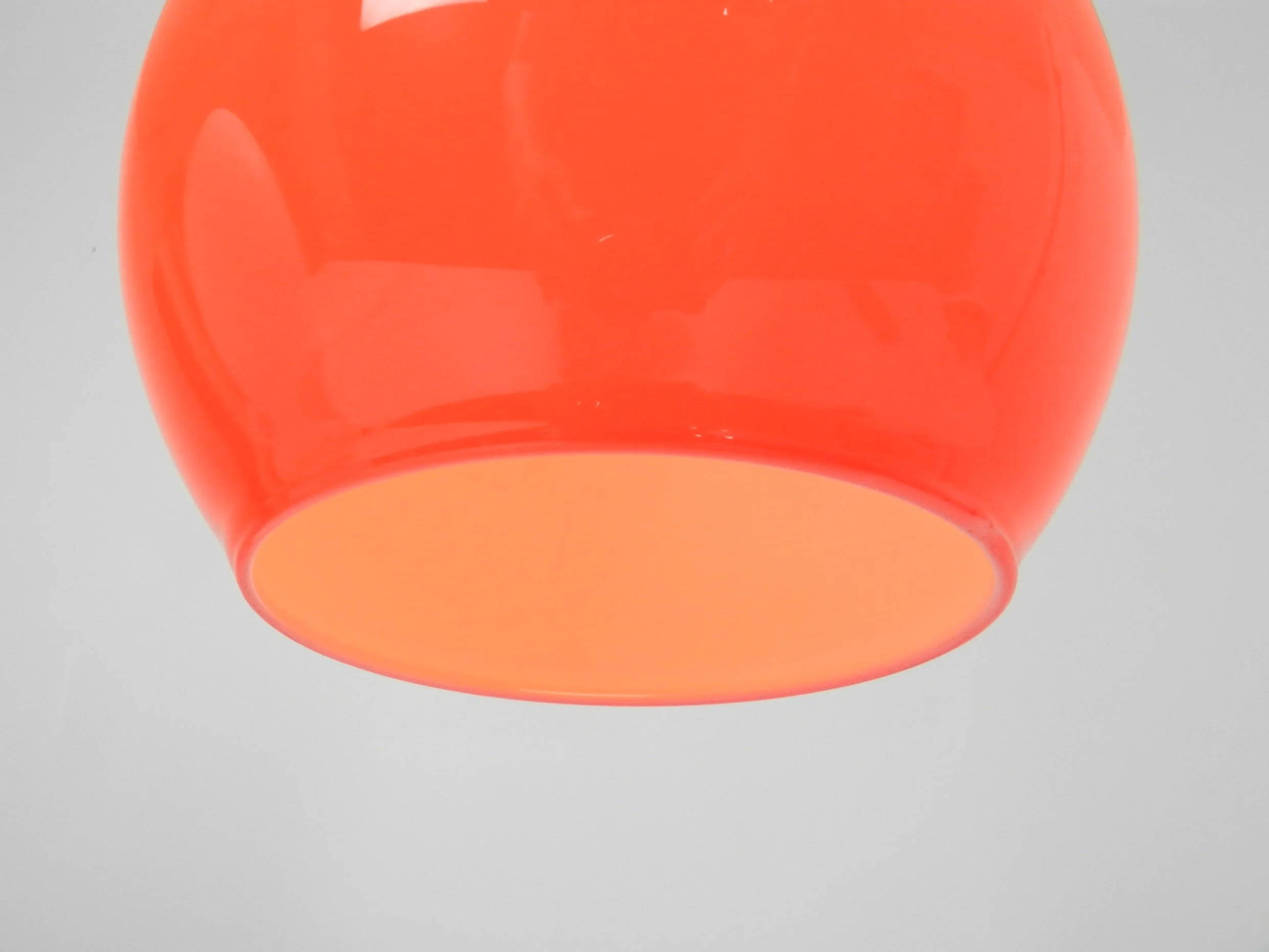Orange and white cased glass pendant lamp.  Scandinavia, 1960s.