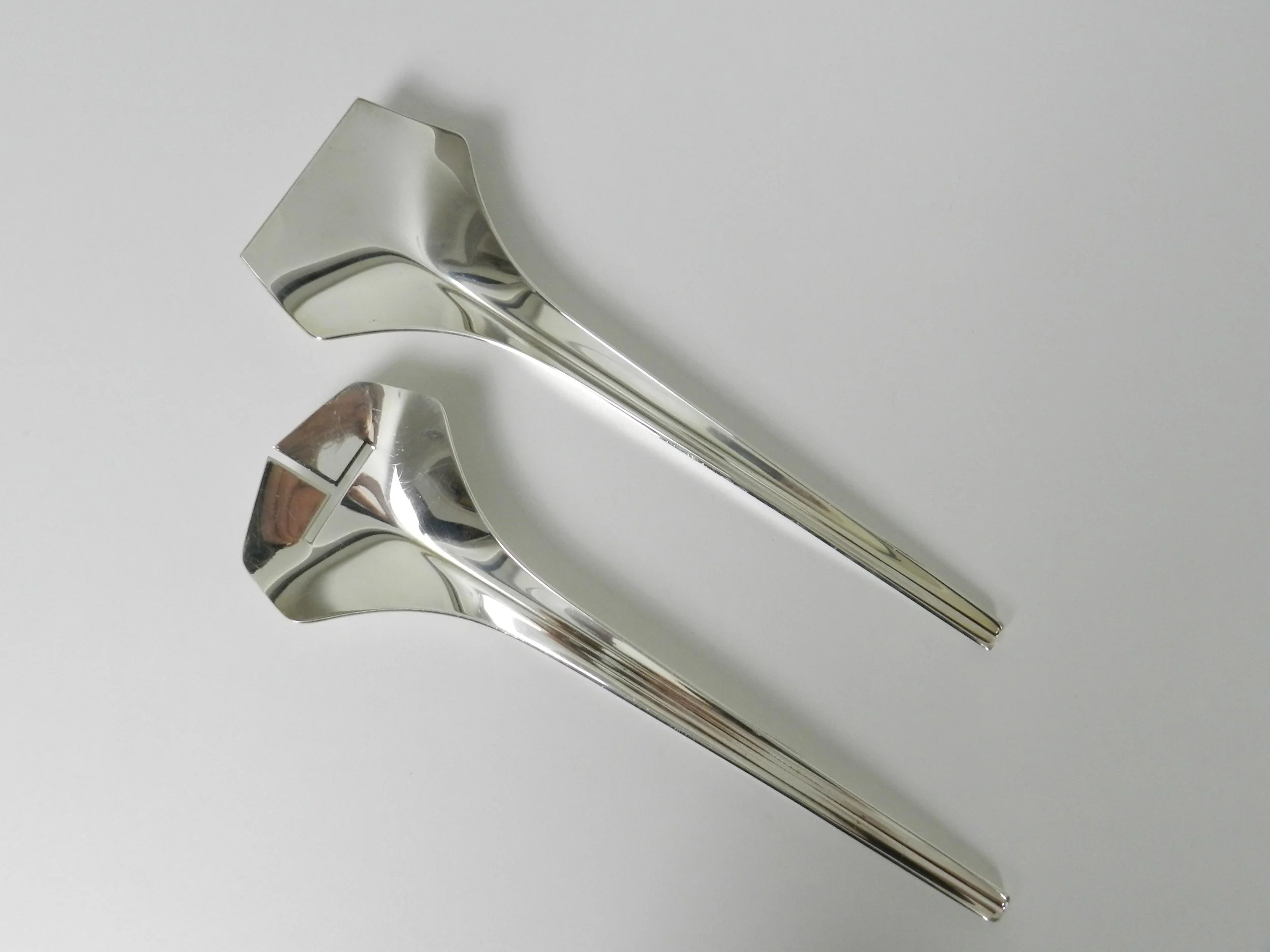 Modernist silver plate salad servers designed by Lino Sabattini.  Italy, 1960s.