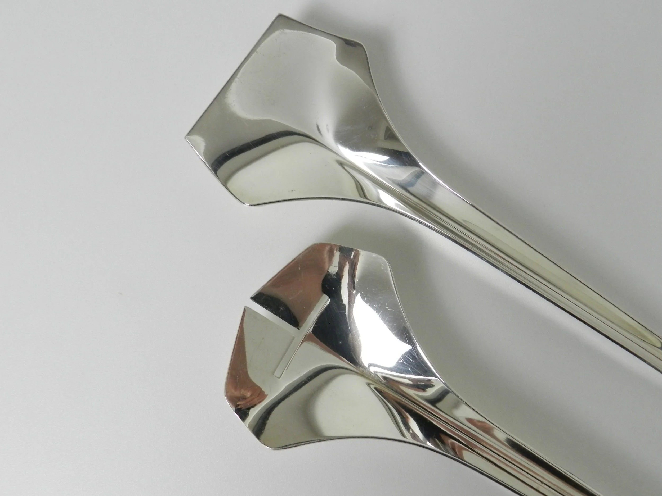 Modernist silver plate salad servers designed by Lino Sabattini.  Italy, 1960s.