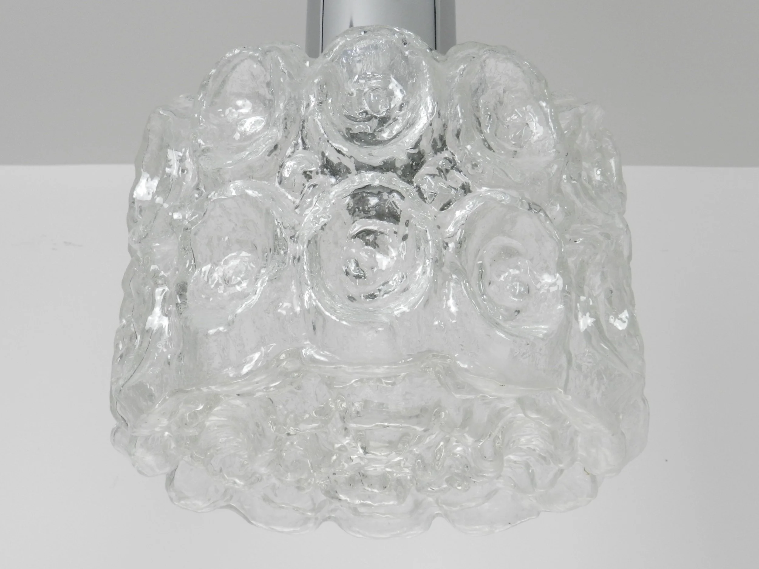 Pendant  lamp in clear textured glass and chrome by Limburg.  Germany, 1970s.