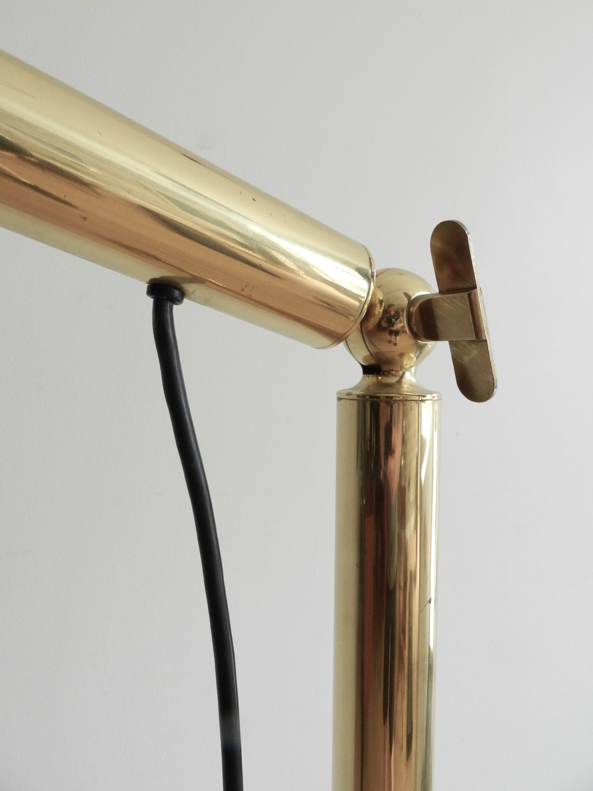 Adjustable very high quality brass “Light Pole” floor lamp designed Ingo Maurer for M Design.  Germany, 1960s.