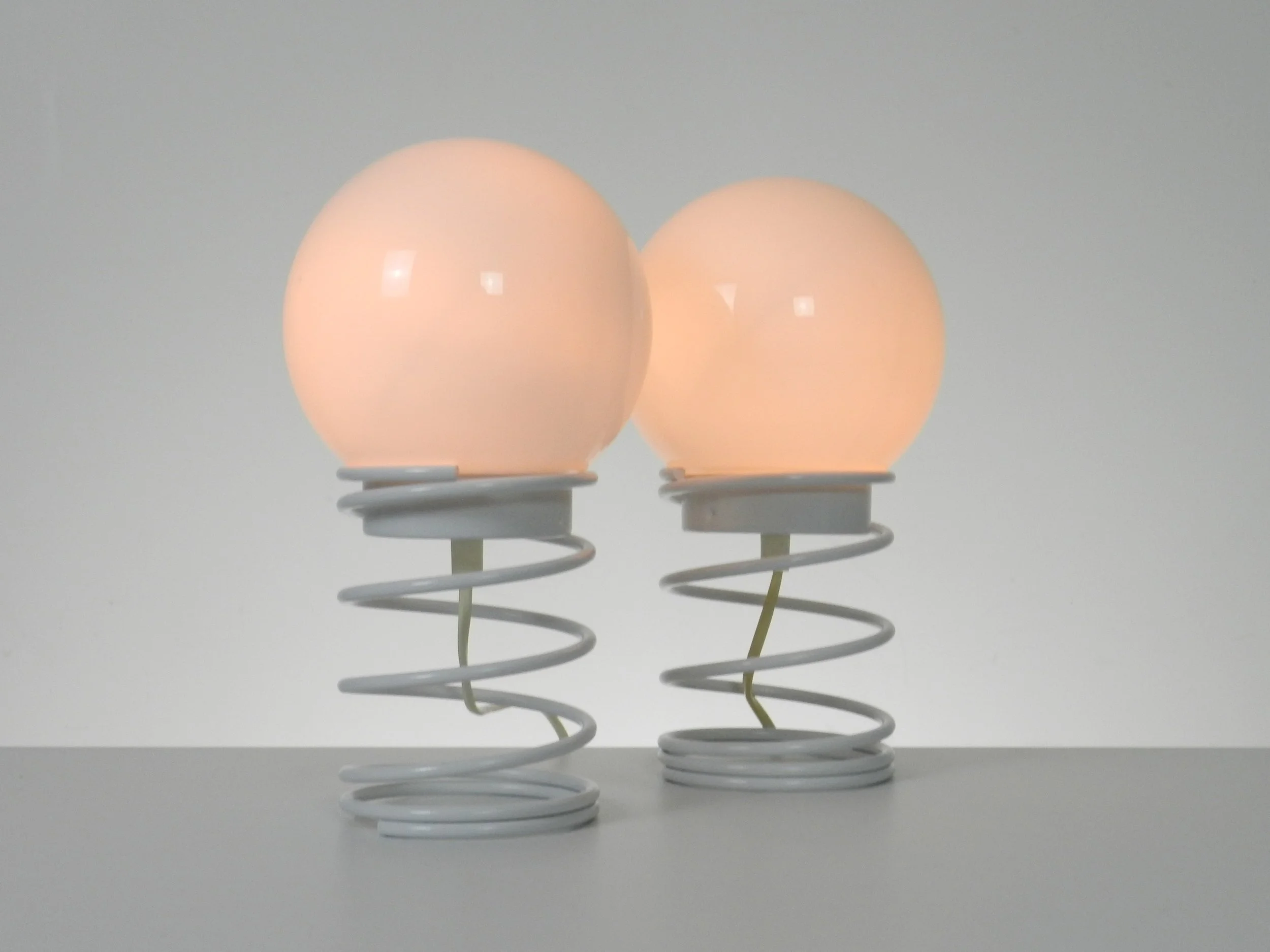 Pair of space age spiral lamp by Woja in painted metal with glass shades.  Netherlands, 1970s.