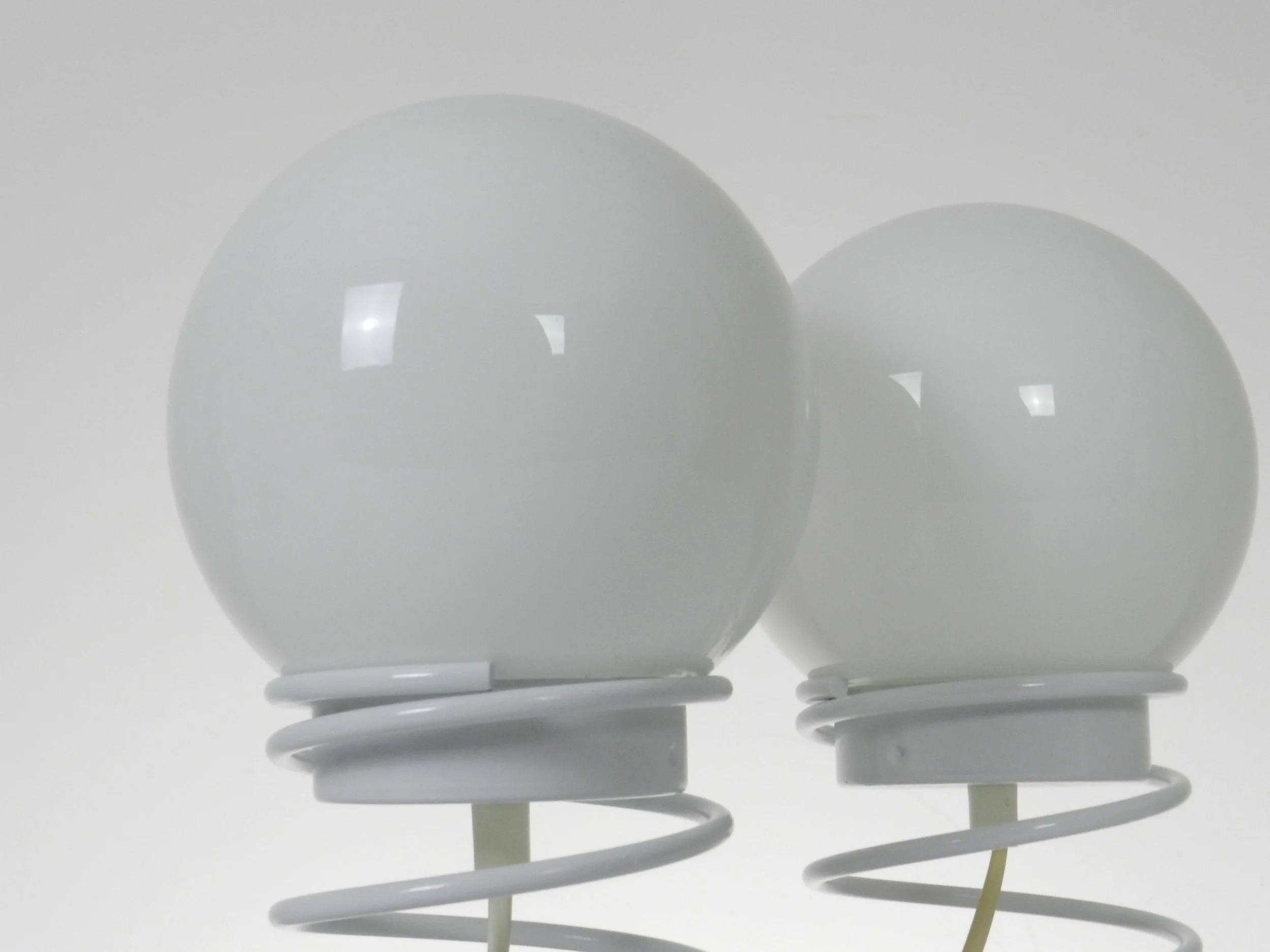 Pair of space age spiral lamp by Woja in painted metal with glass shades.  Netherlands, 1970s.