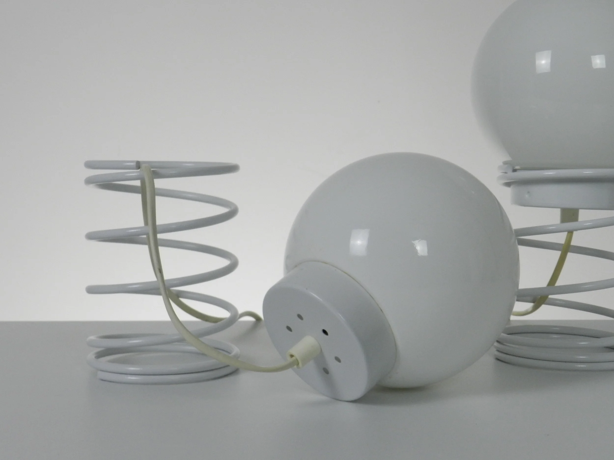 Pair of space age spiral lamp by Woja in painted metal with glass shades.  Netherlands, 1970s.