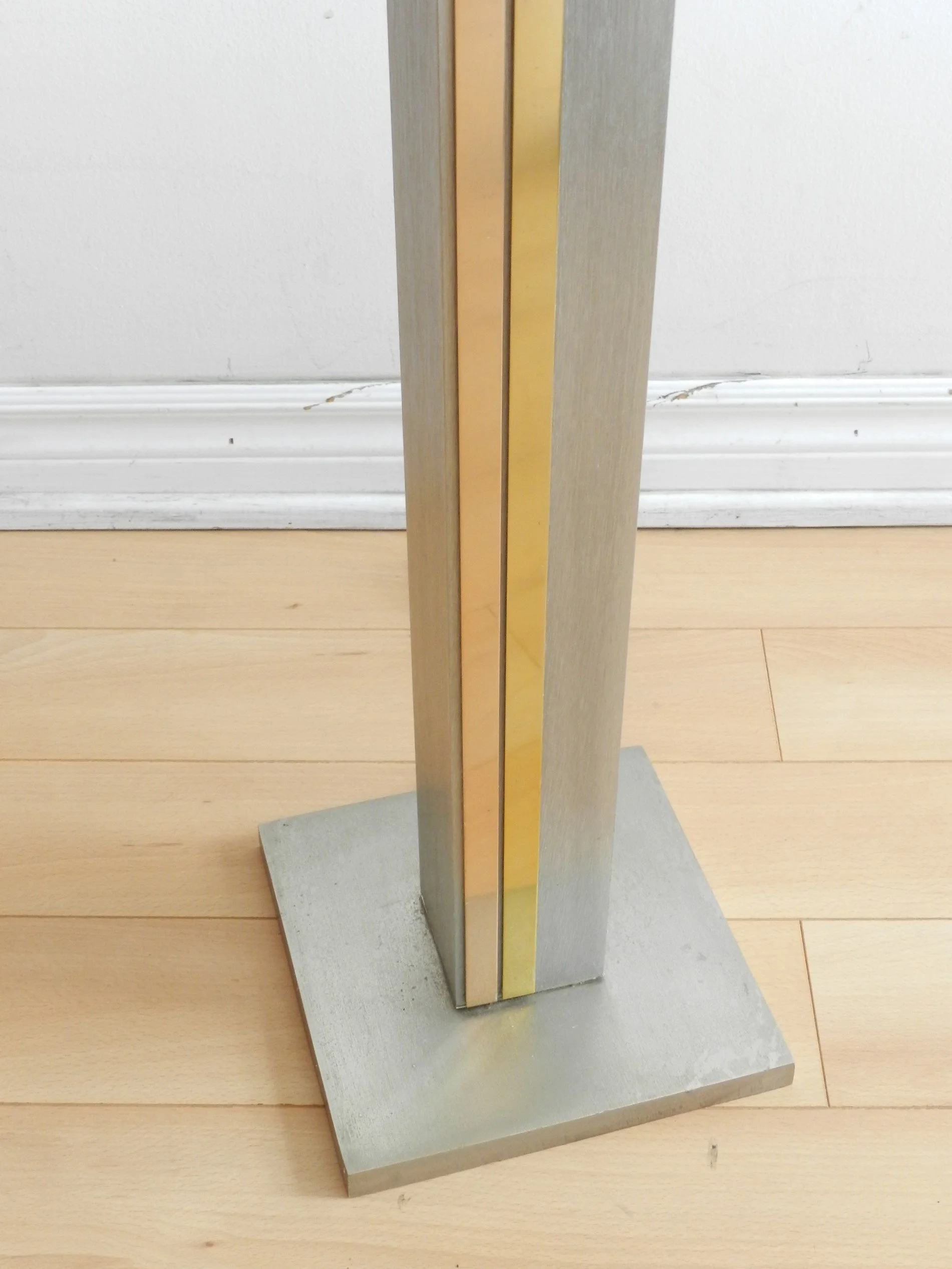 Floor lamp in brushed metal with brass and copper accents designed by Pierre Cardin for Laurel Lamp Company.  USA, 1970s.