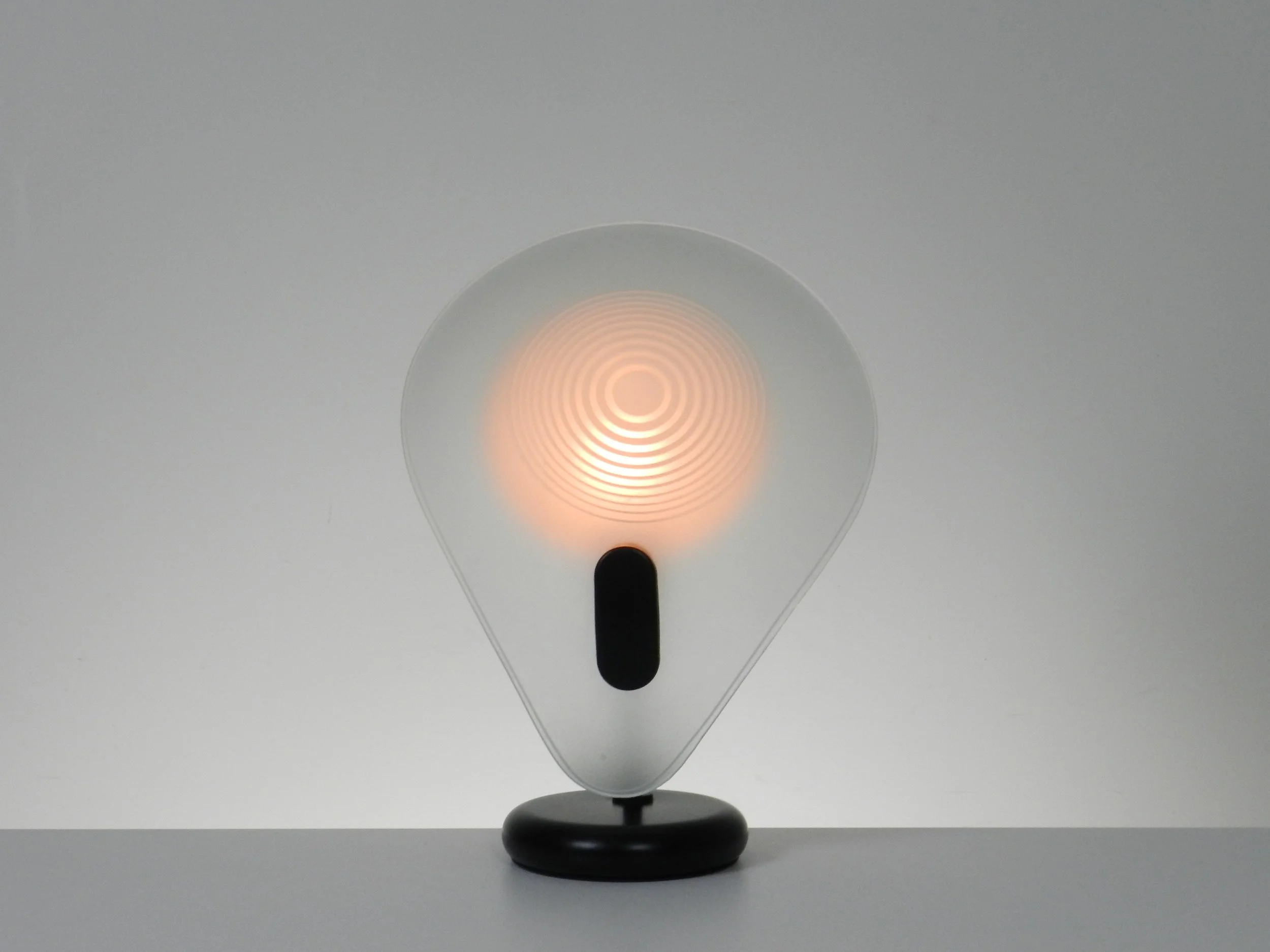 Post modern in enameled metal and glass created by AF Cinquanta.  Italy, 1980s.