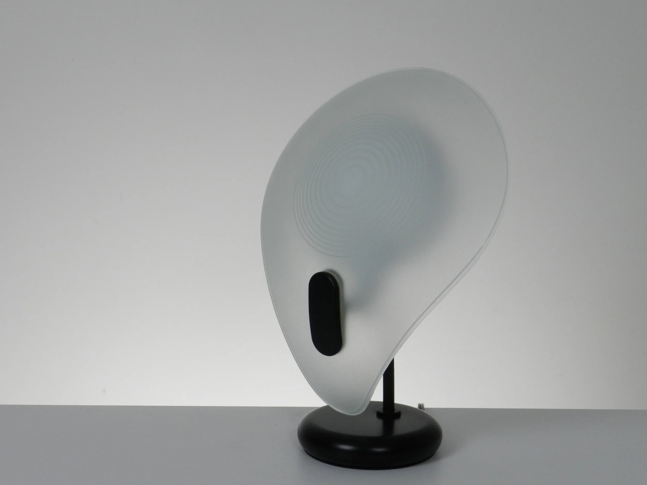 Post modern in enameled metal and glass created by AF Cinquanta.  Italy, 1980s.