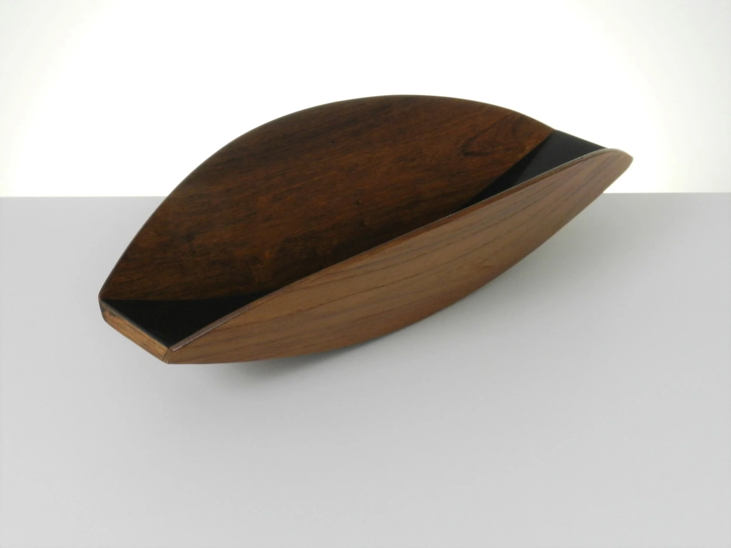 Sculptural teak and laminate bowl. Designer unknown.  Denmark, 1960s.