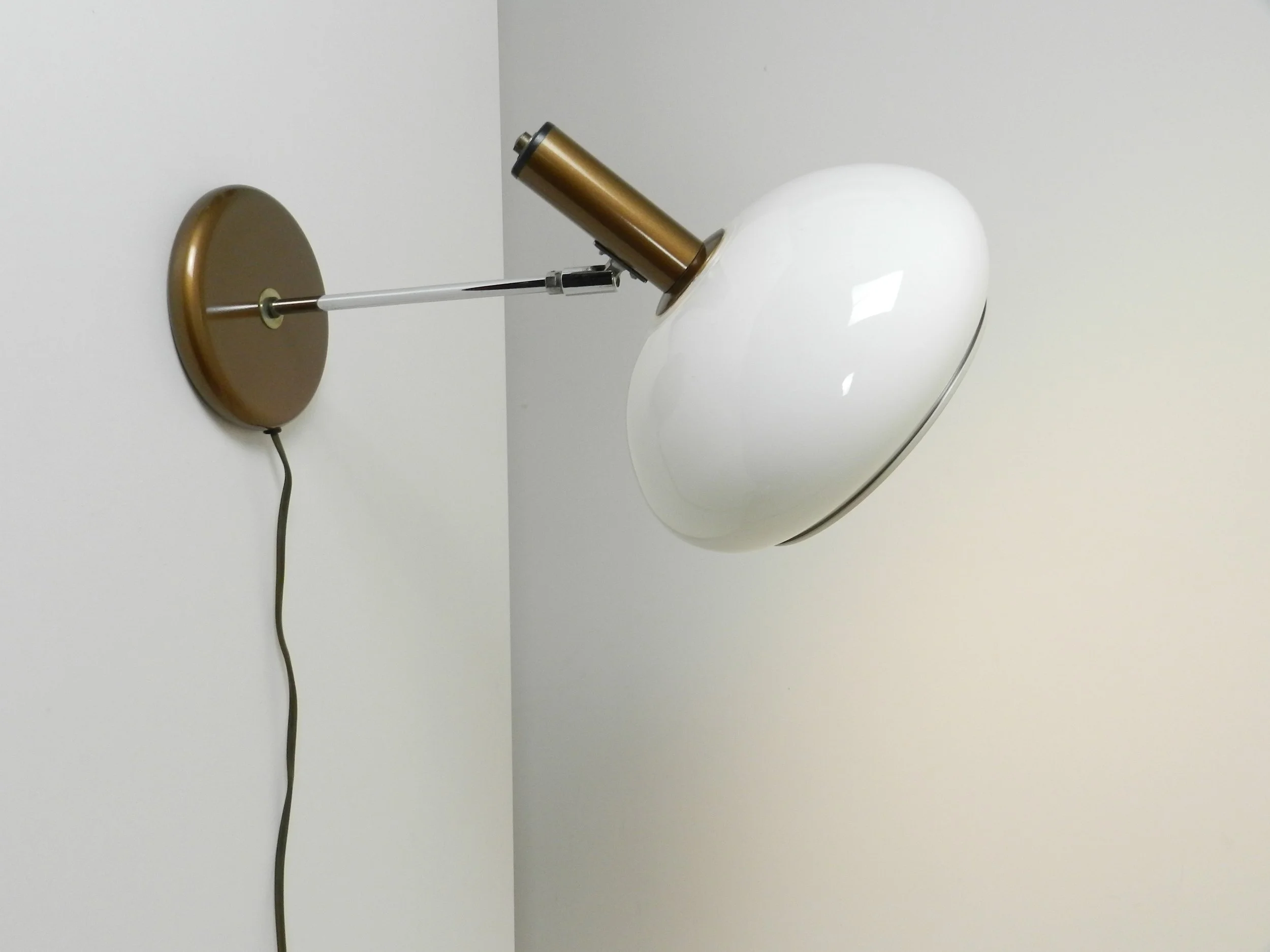 Space age wall lamp metal with plastic shade by Dijkstra.  Netherlands, 1970s.