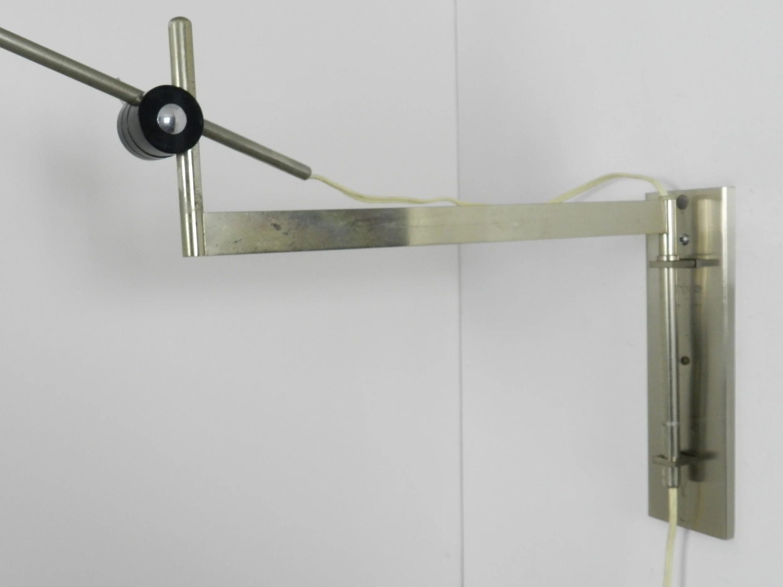 Articulating wall lamp in chrome with enameled metal shade.  Netherlands, 1960s.