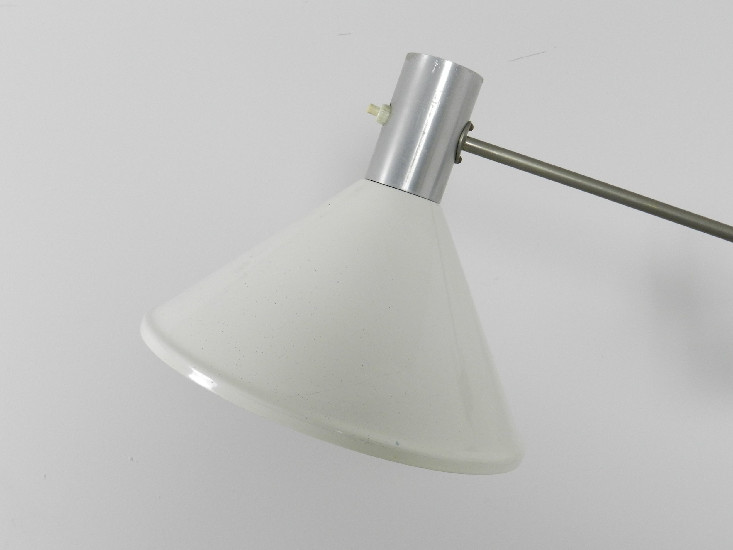 Articulating wall lamp in chrome with enameled metal shade.  Netherlands, 1960s.