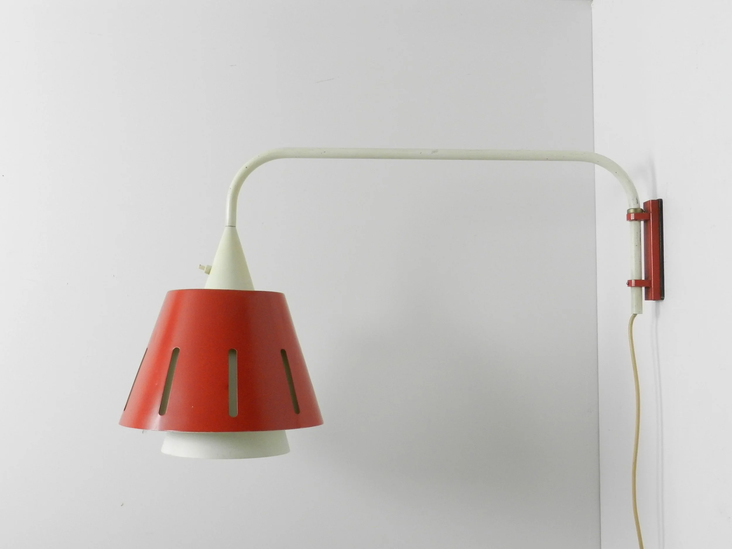 Very rare mid century wall lamp designed by H. Busquet for Hala Zeist.  Netherlands, 1950s.