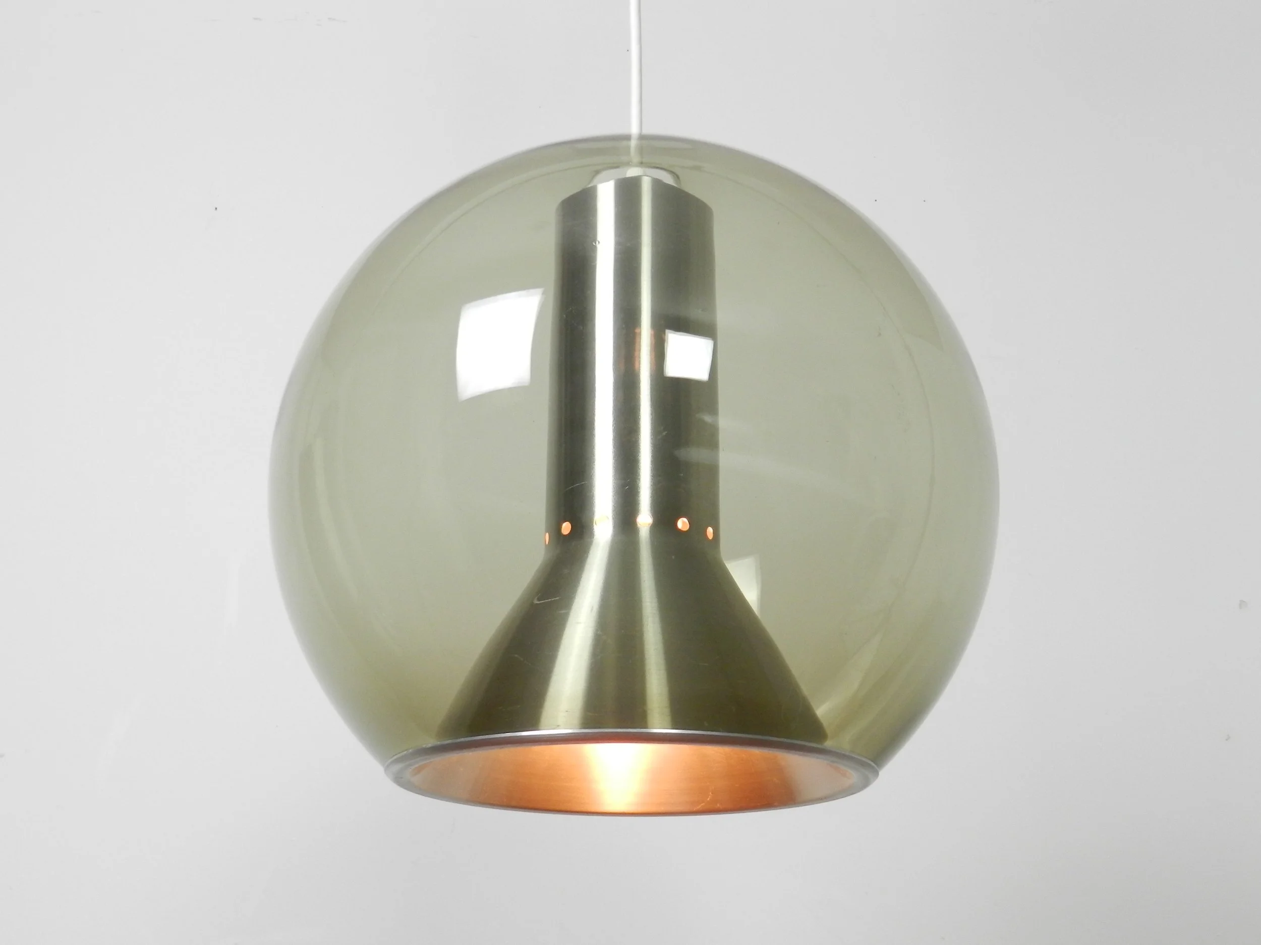 Large globe pendant lamp in glass and aluminum. Designed by Frank Ligtelijn for Raak.  Netherlands, 1960s.