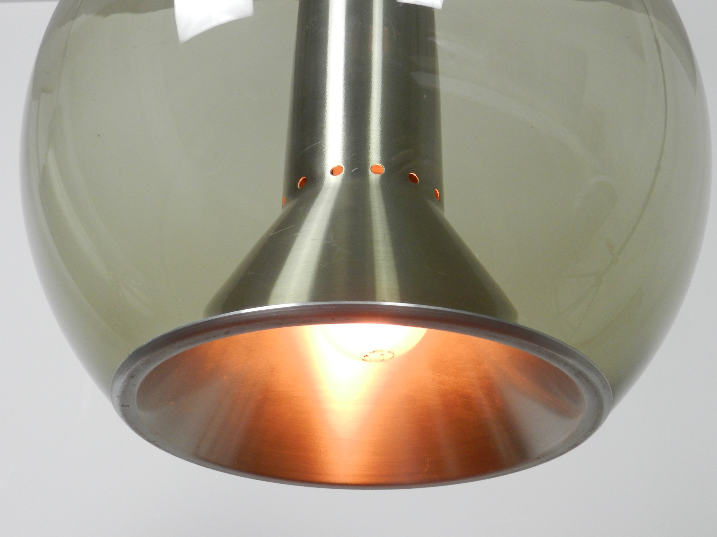 Large globe pendant lamp in glass and aluminum. Designed by Frank Ligtelijn for Raak.  Netherlands, 1960s.